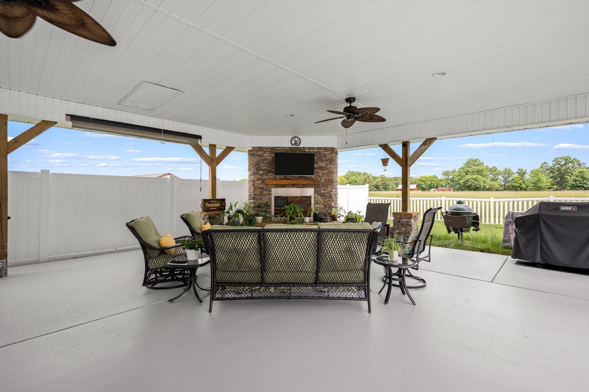 144 Richland Ct, Manchester, TN 37355 Step outside to discover the fabulous pool pavilion equipped with a custom stonework wood-burning fireplace, and a TV. Perfect for outdoor entertaining!
