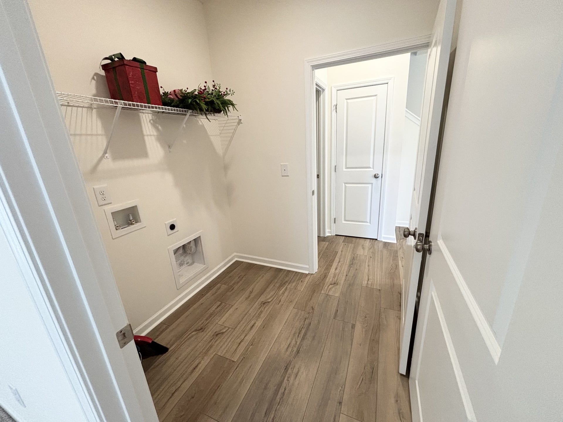 552 Nightengale Ridge Dr, Columbia, TN 38401 Laundry room accessible from the primary bedroom and the hallway