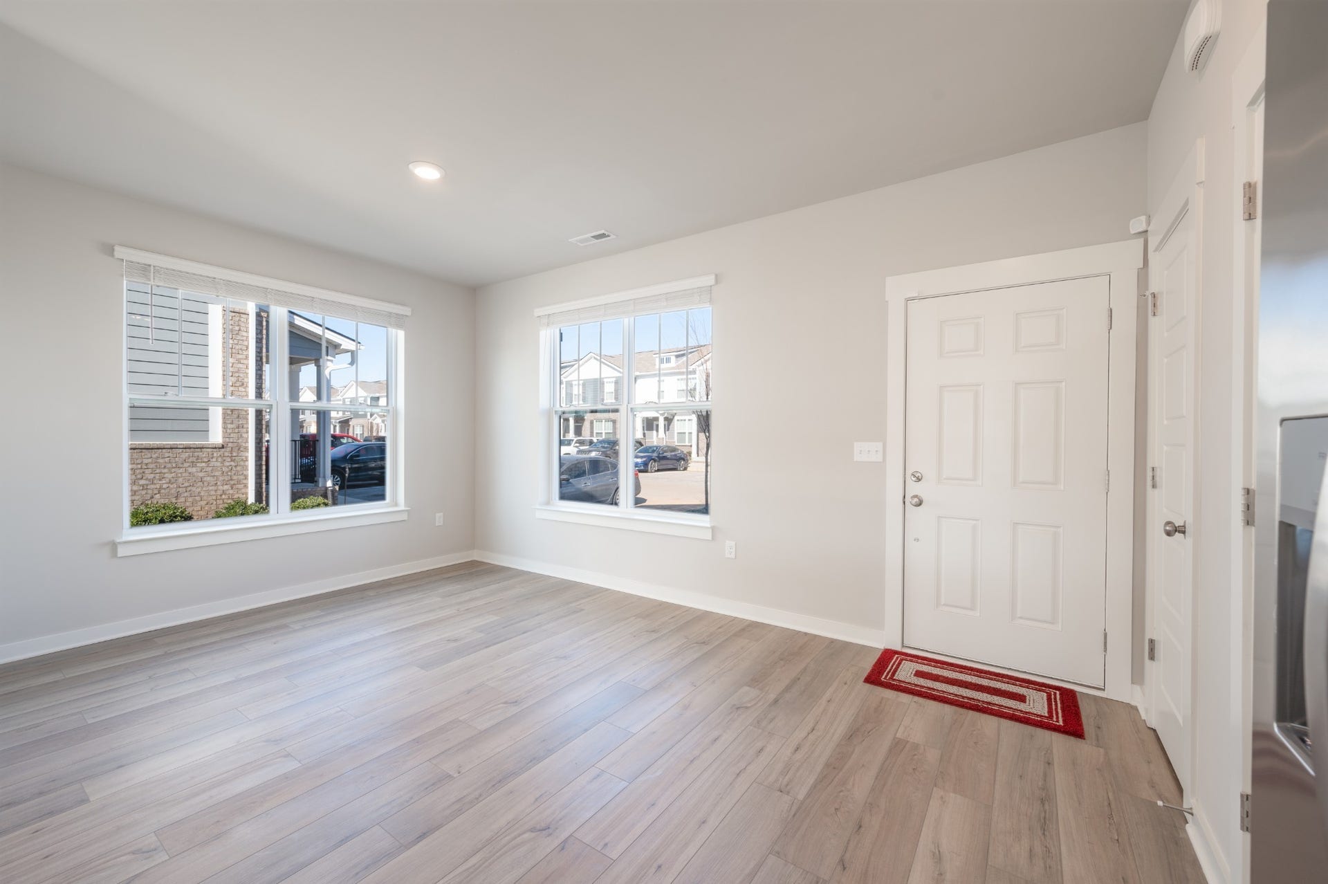 Extra windows and natural light in the living room in this end-unit townhome