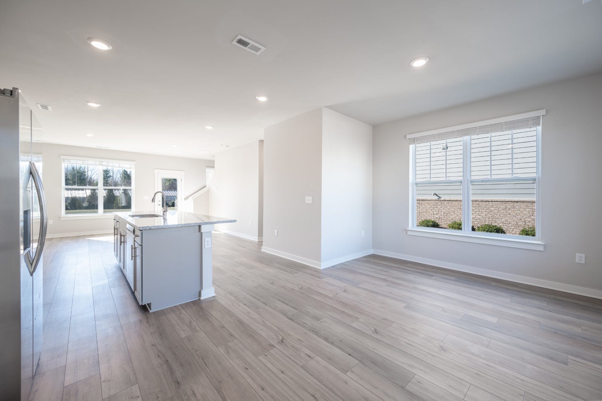 Kitchen open to the living and dining rooms