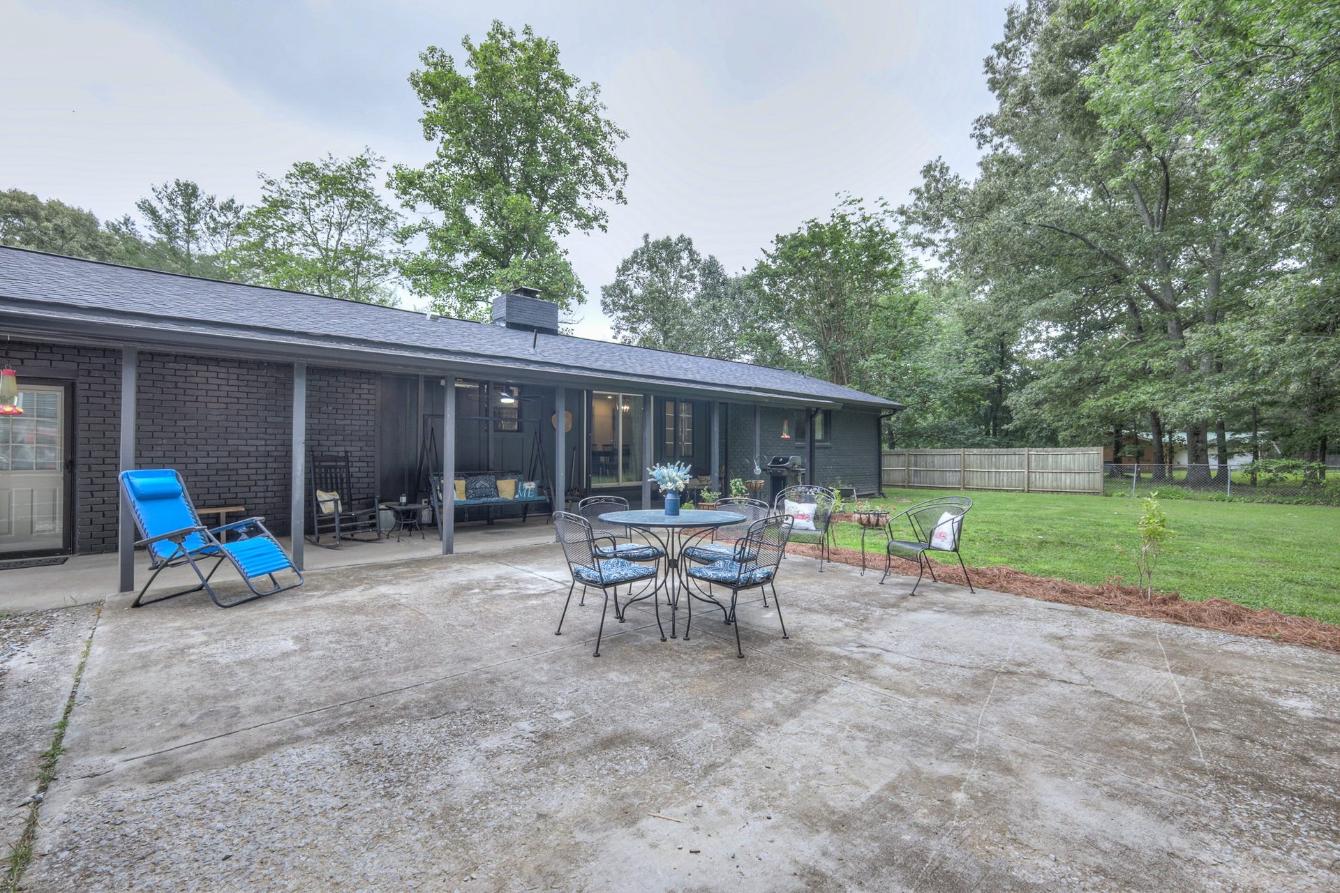 1104 Remington Pl, Manchester, TN 37355 Large concrete pad extending from covered patio to design you own outdoor area