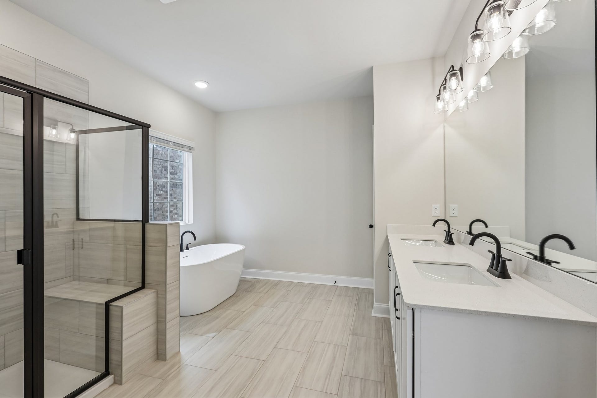 2718 Willowoak Trl, #2901, Murfreesboro, TN 37129 The primary bathroom features dual sinks with quartz countertops, offering a perfect blend of style and everyday functionality.