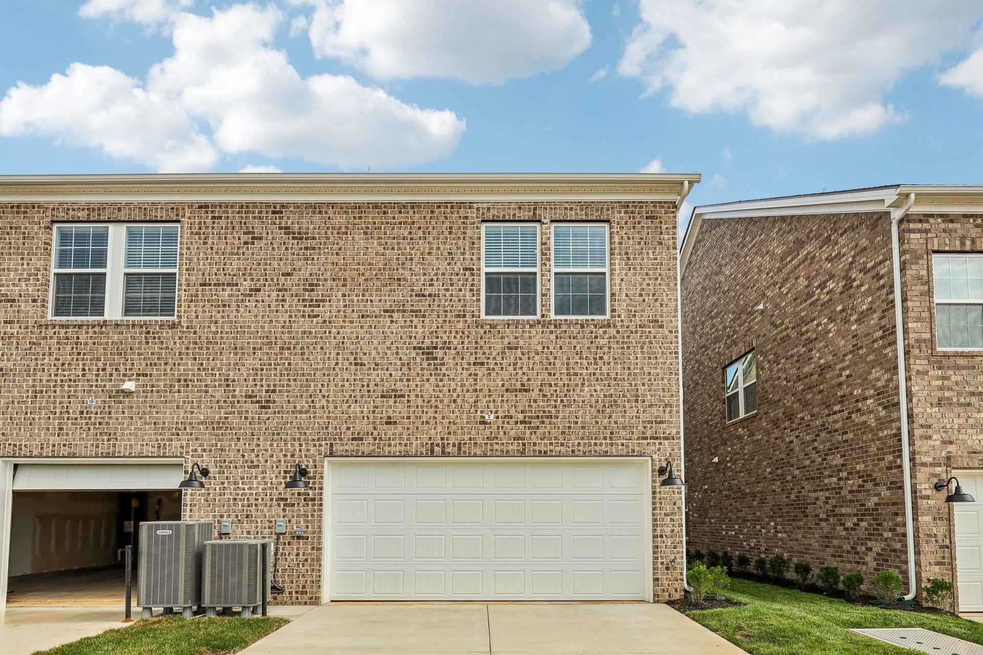 2718 Willowoak Trl, #2901, Murfreesboro, TN 37129 The attached two-car garage provides ample space for parking and storage, with two additional driveway spots offering added convenience for guests or extra vehicles.