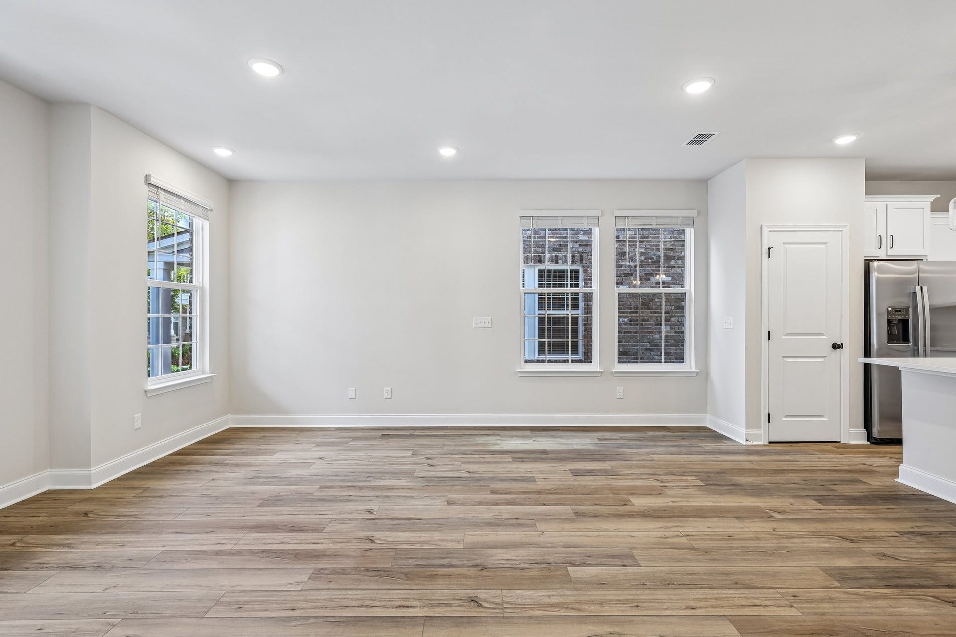 2718 Willowoak Trl, #2901, Murfreesboro, TN 37129 Expansive windows flood this end-unit townhouse with abundant natural light, creating a bright and welcoming living space.