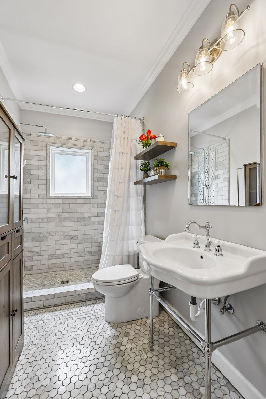 186 Sulphur Springs Rd, Shelbyville, TN 37160 This beautiful bath is fully tiled with upgraded lighting and fixtures plus storage cabinet! 186 Sulphur Springs Rd, Shelbyville, TN 37160