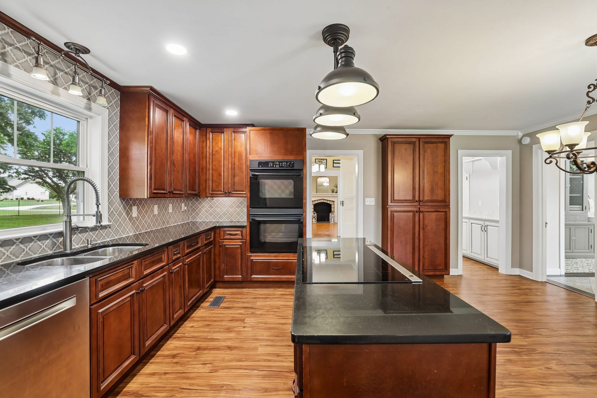 186 Sulphur Springs Rd, Shelbyville, TN 37160 Multiple light sources including recessed lighting, under cabinet lighting, and decorative drop fixtures set the stage for this dreamy kitchen! 186 Sulphur Springs Rd, Shelbyville, TN 37160