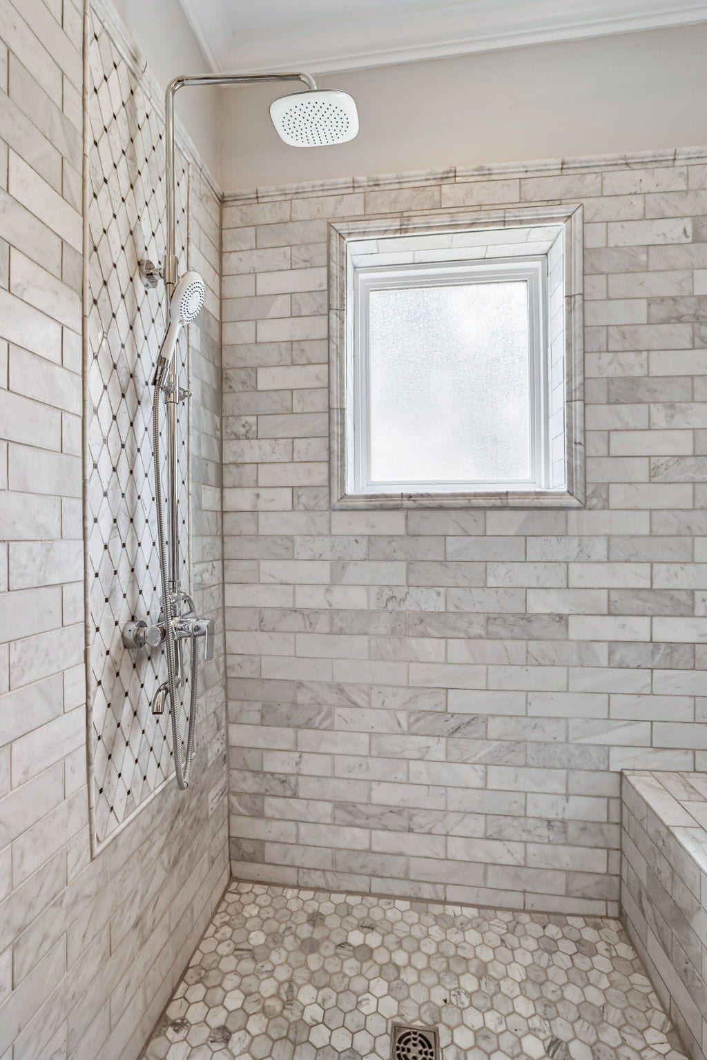 186 Sulphur Springs Rd, Shelbyville, TN 37160 Custom tiled shower with rain shower head plus a pull down sprayer, a bench, and window for natural light! 186 Sulphur Springs Rd, Shelbyville, TN 37160