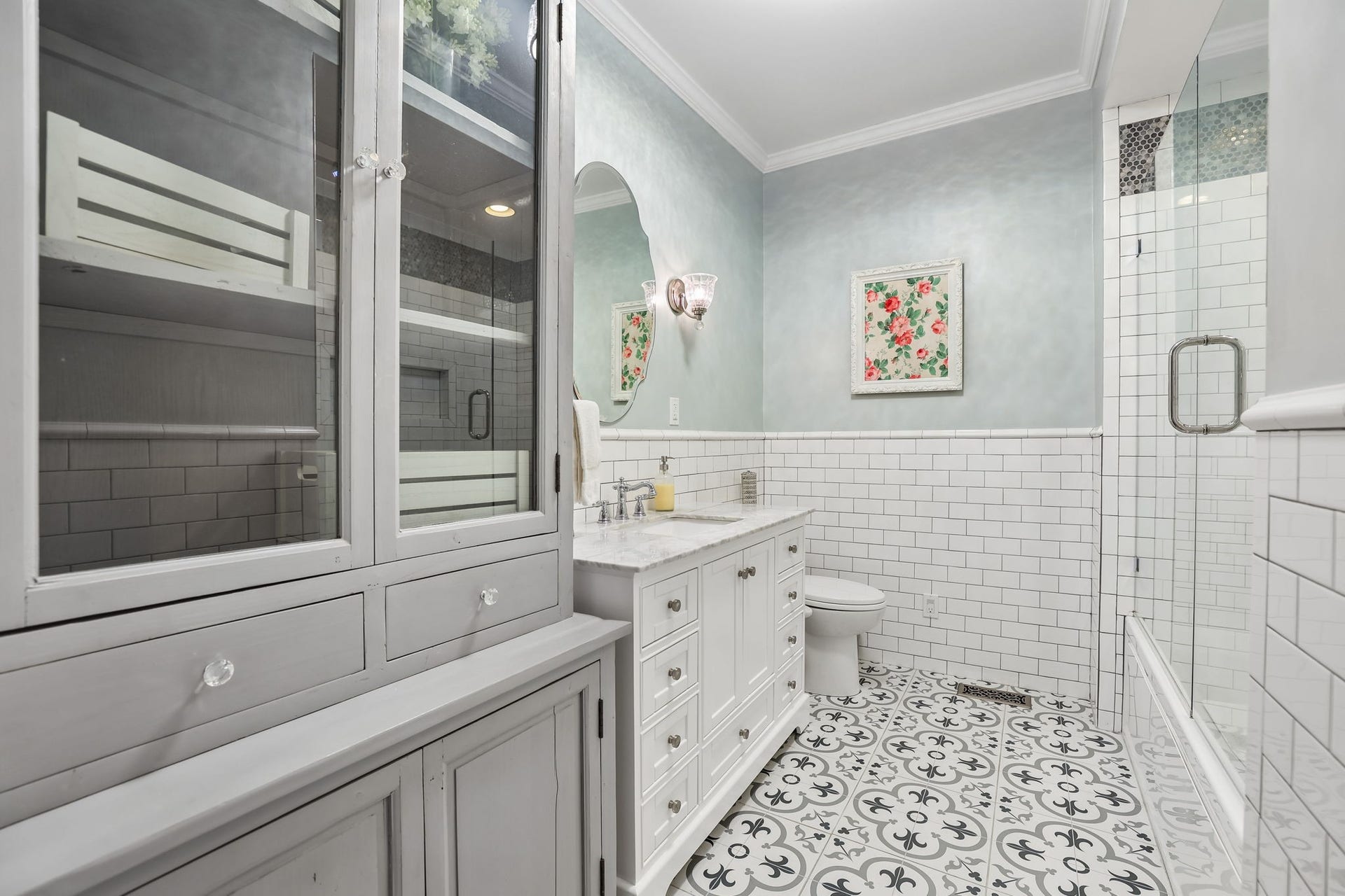 186 Sulphur Springs Rd, Shelbyville, TN 37160 Primary suite's bathroom has classic tilework on floor and walls and includes a framed piece of the original wallpaper! 186 Sulphur Springs Rd, Shelbyville, TN 37160