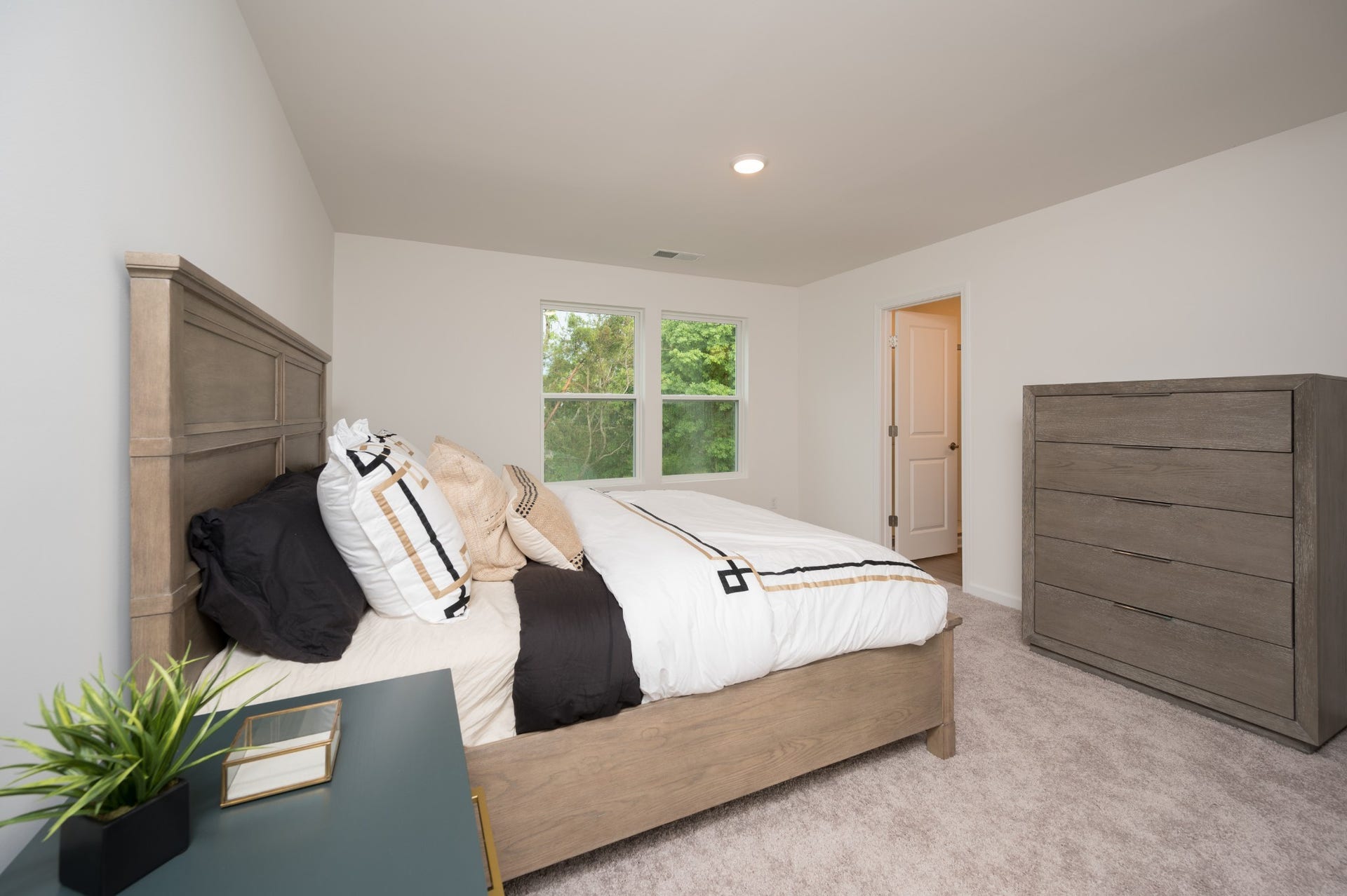 3206 Hearth Hollow Rd, Columbia, TN 38401 Primary bedroom - 1 of 4 total bedrooms - with views of the backyard tree line