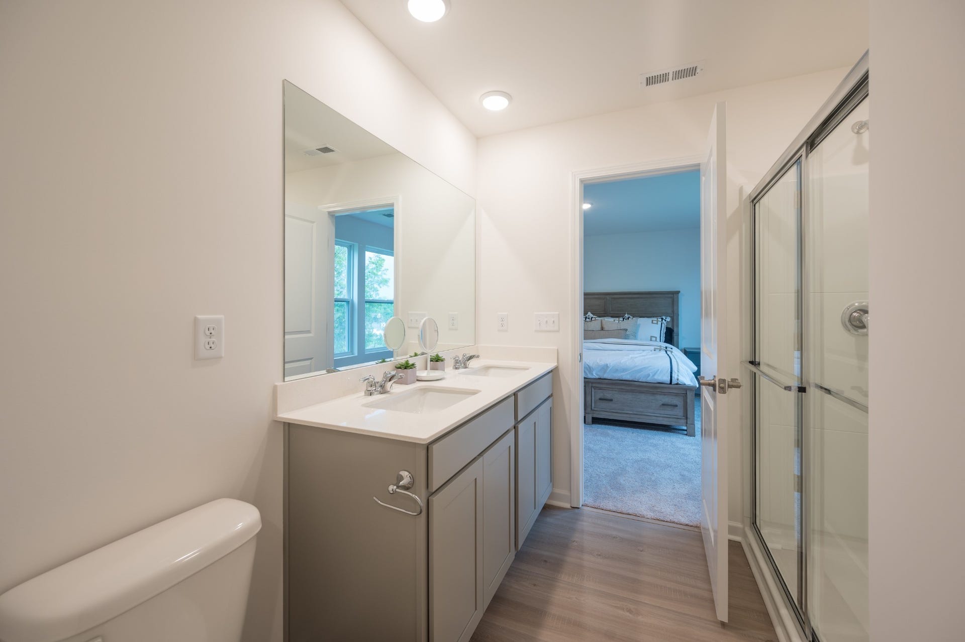 3206 Hearth Hollow Rd, Columbia, TN 38401 Primary suite with dual sinks and walk-in shower