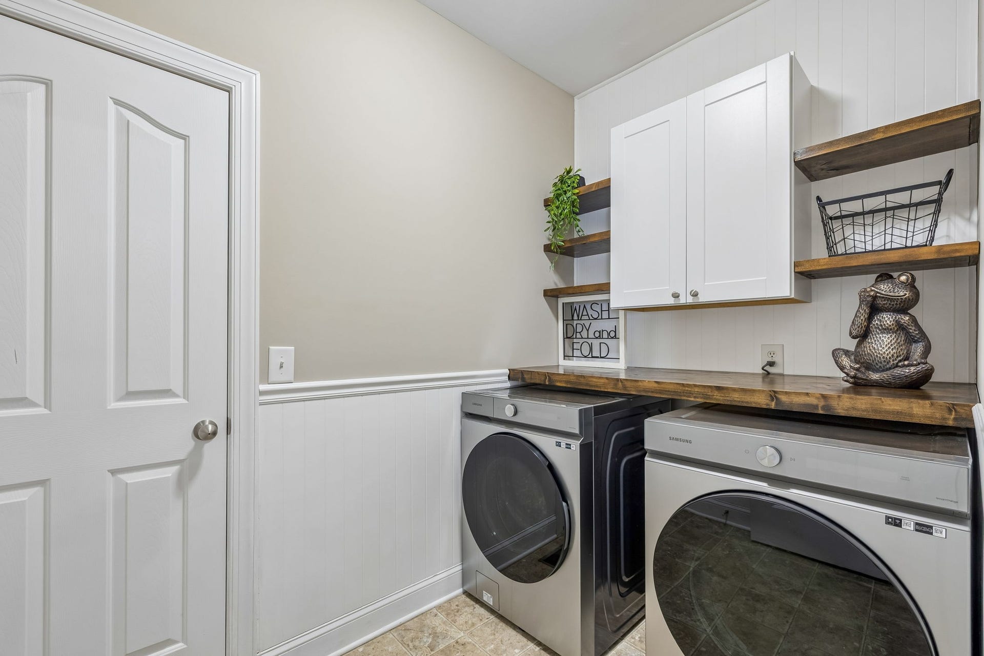 3444 Blaze Dr, Murfreesboro, TN 37128 Laundry room with cabinet and Open Shelving as well as folding space