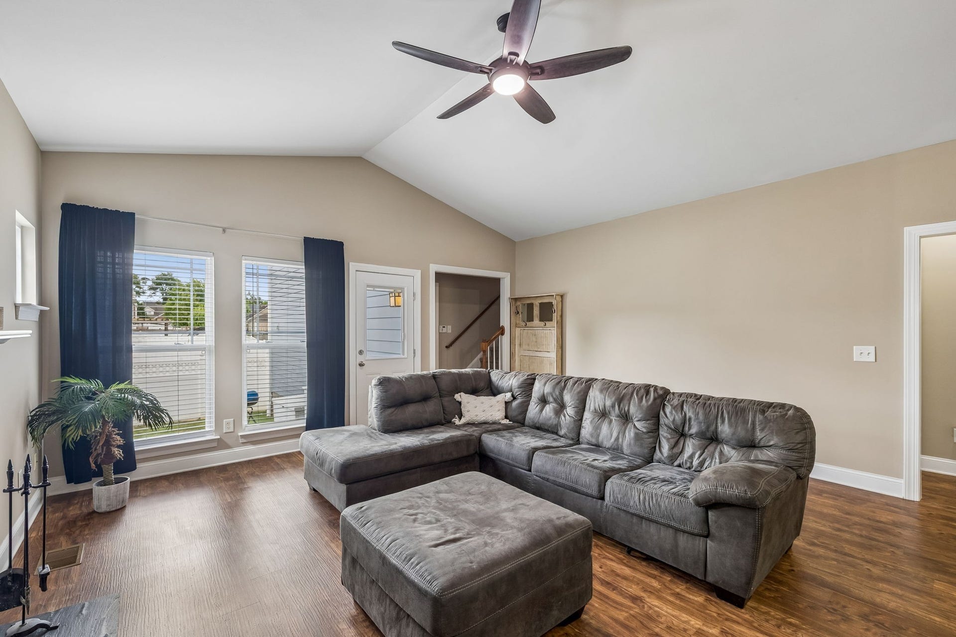 3444 Blaze Dr, Murfreesboro, TN 37128 Living Room has vaulted ceilings and access to Back Yard