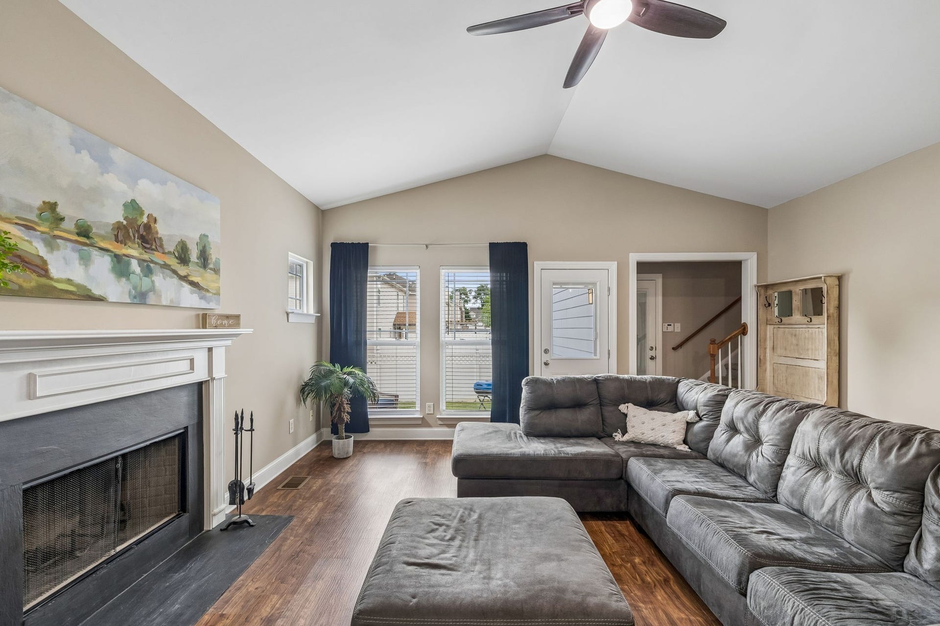 3444 Blaze Dr, Murfreesboro, TN 37128 Living Room also has door to garage and stairs leading to private Bonus room