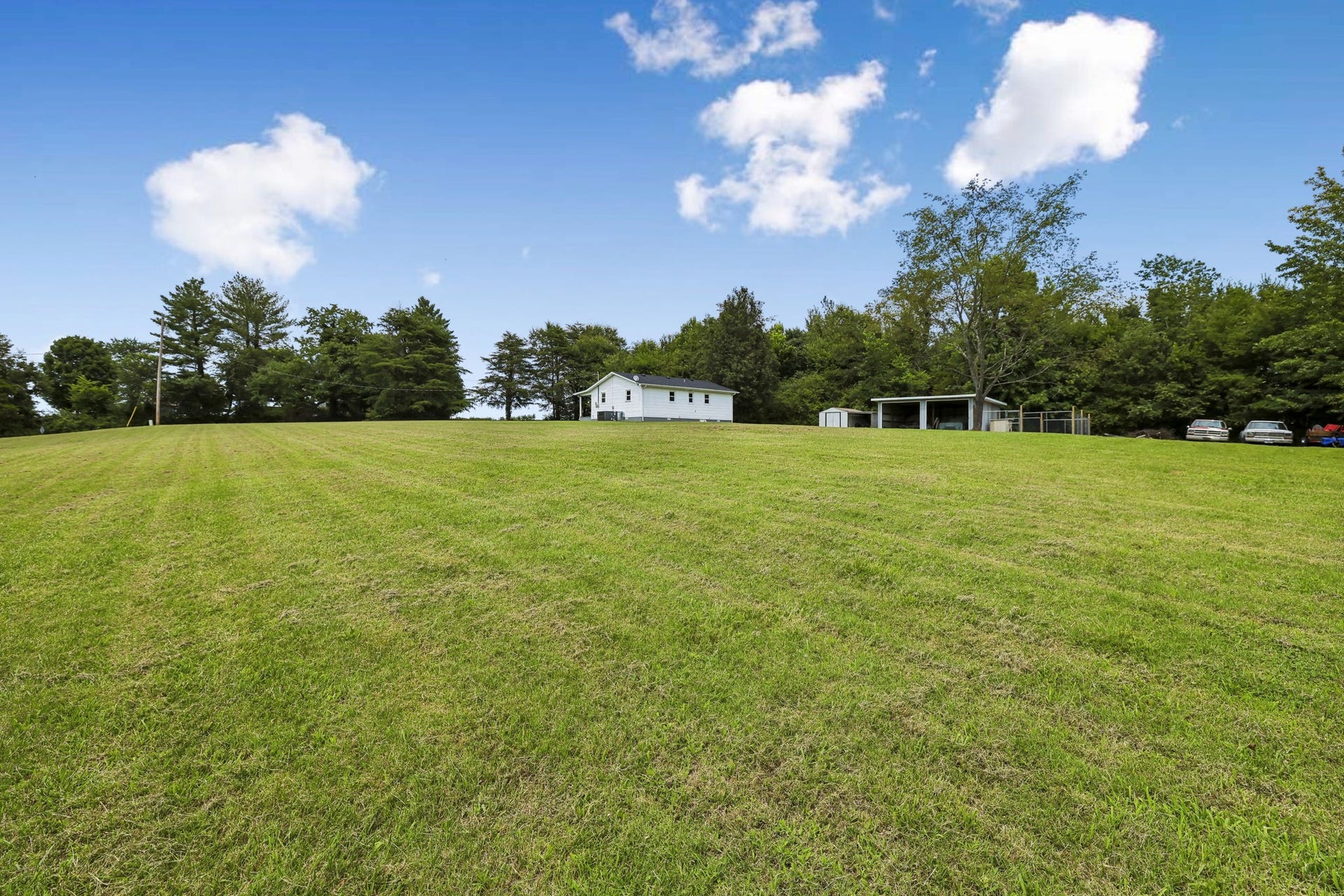 2420 Hawkersmith Rd, Manchester, TN 37355 Updates to this home include a new roof in 2026, new HVAC & water heater in 2020! 2420 Hawkersmith Rd, Manchester, TN 37355