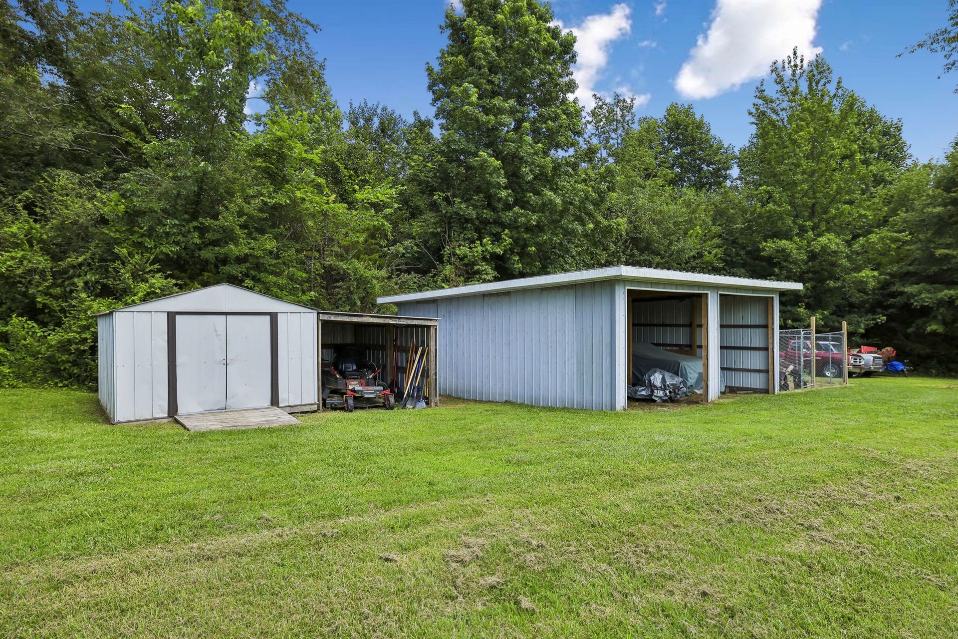 2420 Hawkersmith Rd, Manchester, TN 37355 Your large backyard includes a storage building plus a double bay shed! 2420 Hawkersmith Rd, Manchester, TN 37355