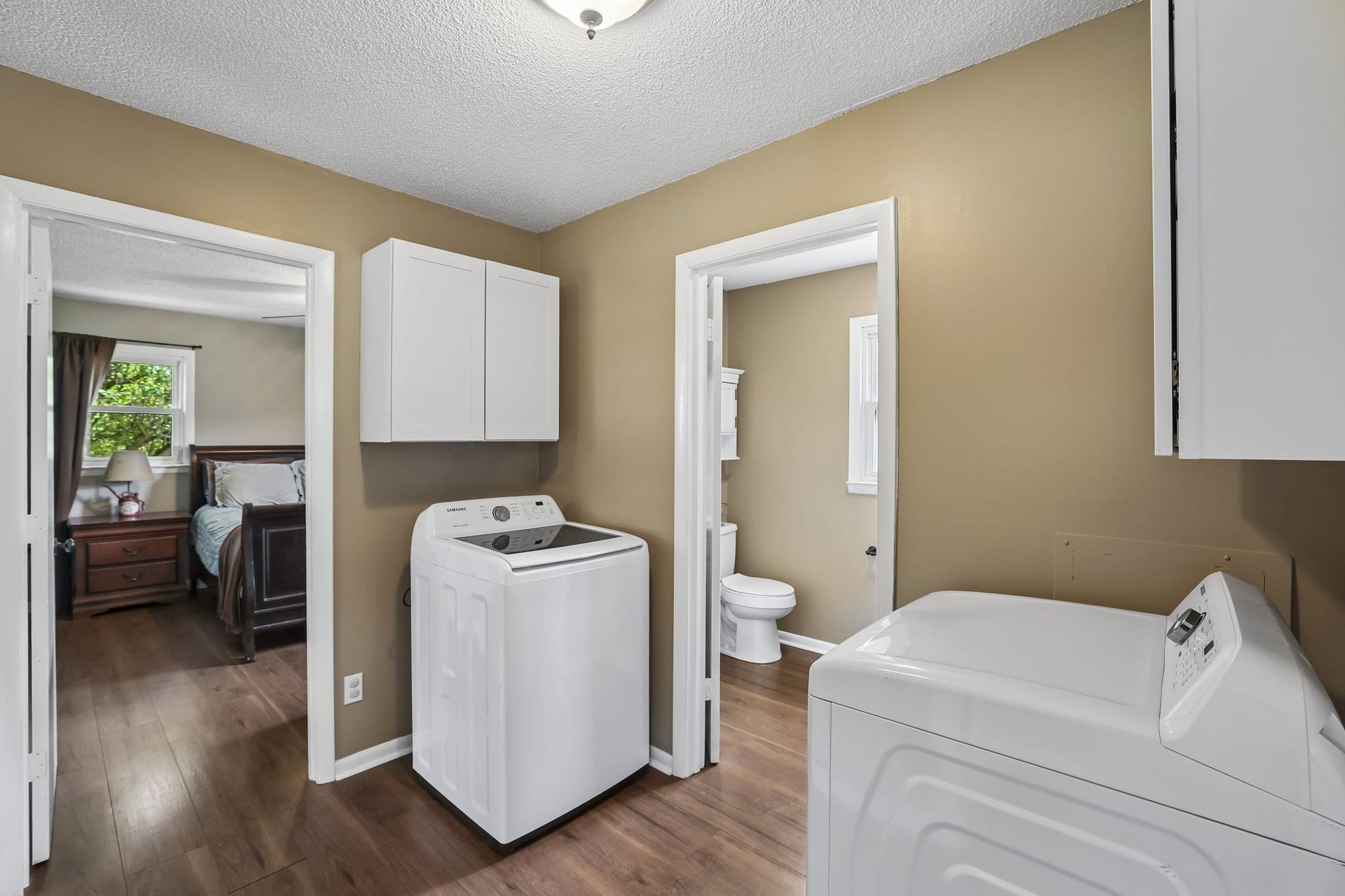 2420 Hawkersmith Rd, Manchester, TN 37355 Laundry area includes cabinets for storing your essentials! 2420 Hawkersmith Rd, Manchester, TN 37355