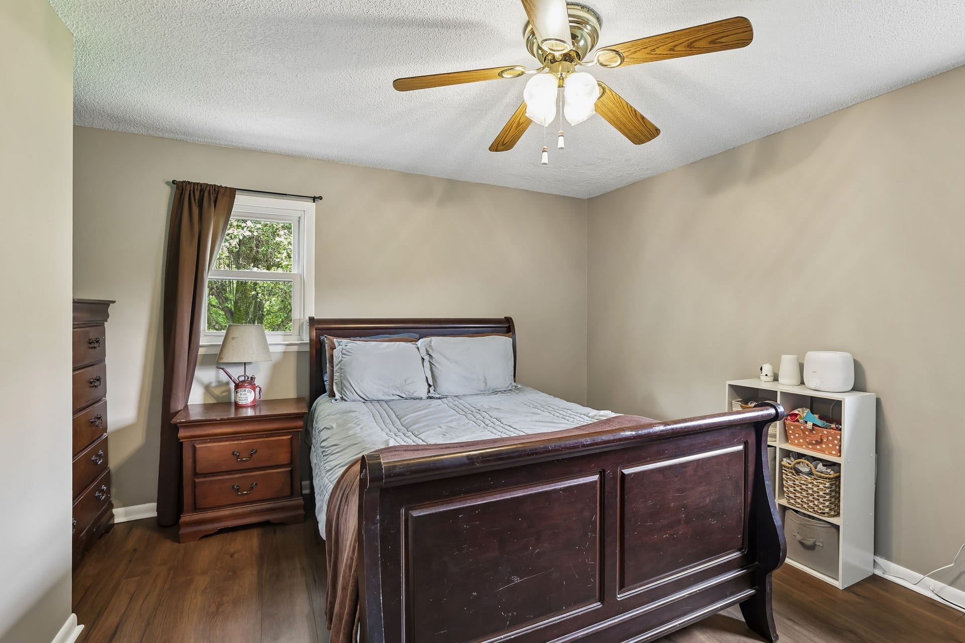 2420 Hawkersmith Rd, Manchester, TN 37355 One of two bedrooms with a neutral color palette and ceiling fan! 2420 Hawkersmith Rd, Manchester, TN 37355