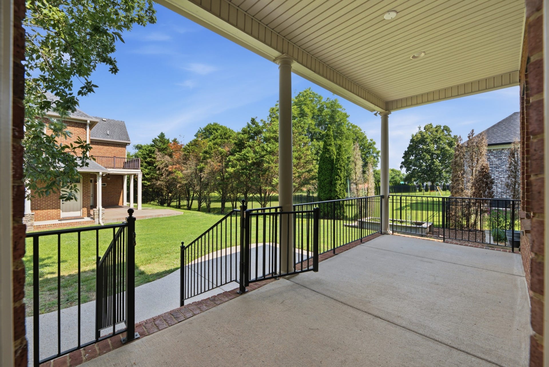 2926 Frank Robinson Dr, Murfreesboro, TN 37130 Covered porch of main house looking towards guest house