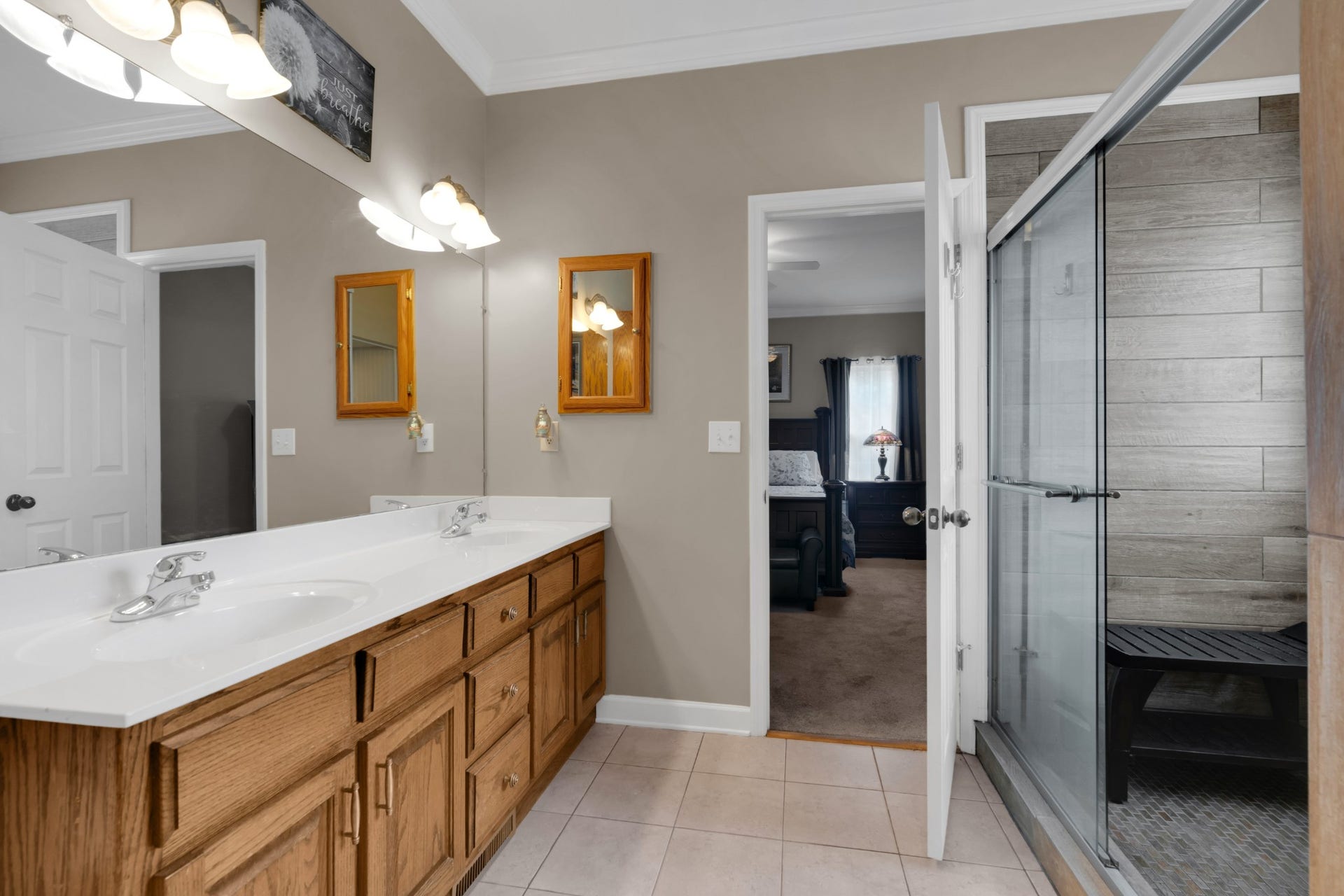 621 Big Oak Dr, Manchester, TN 37355 Master Bath with dual sinks and tiled shower.