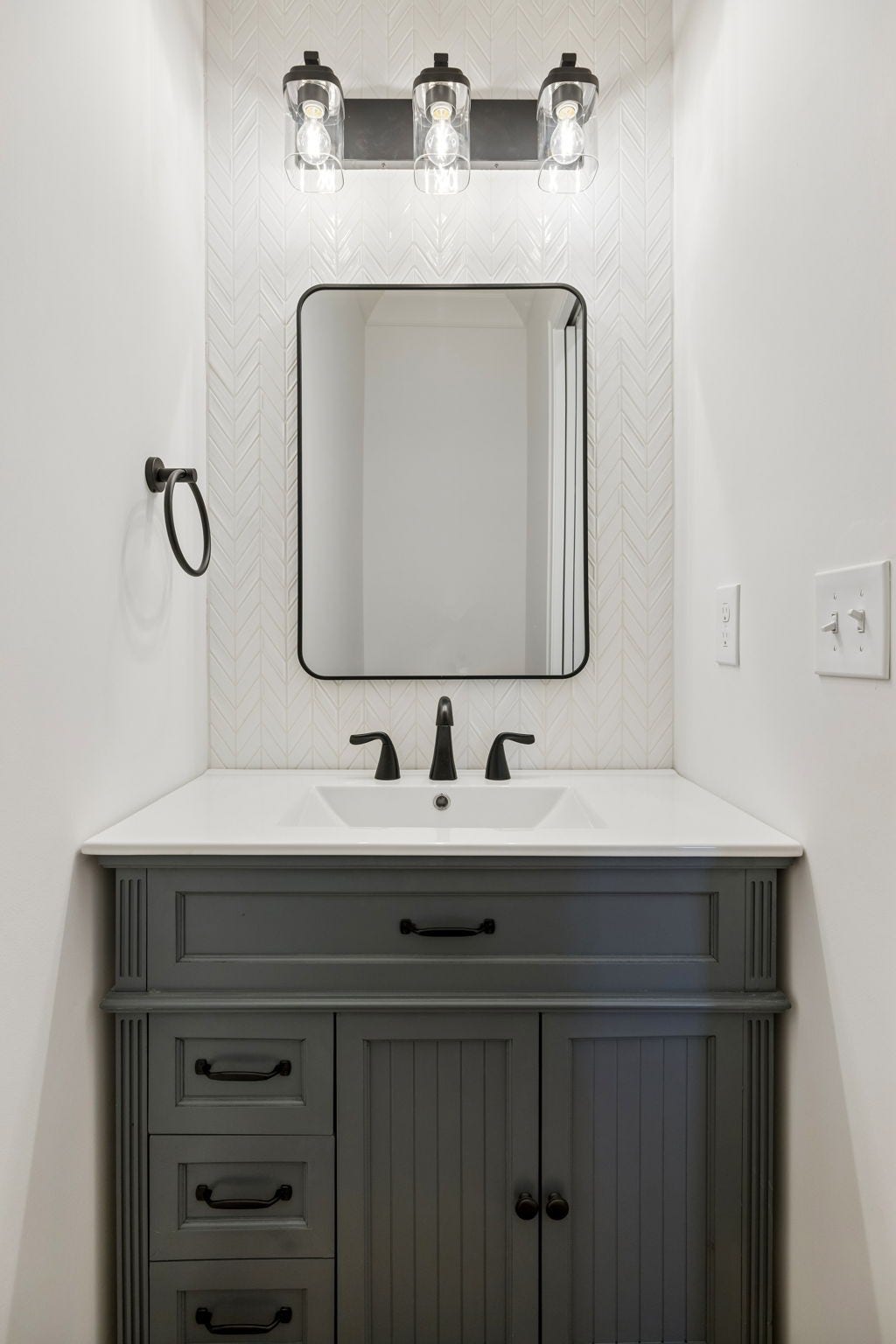 2472 Taylor Rd, Columbia, TN 38401 Half bathroom with tiled accent wall