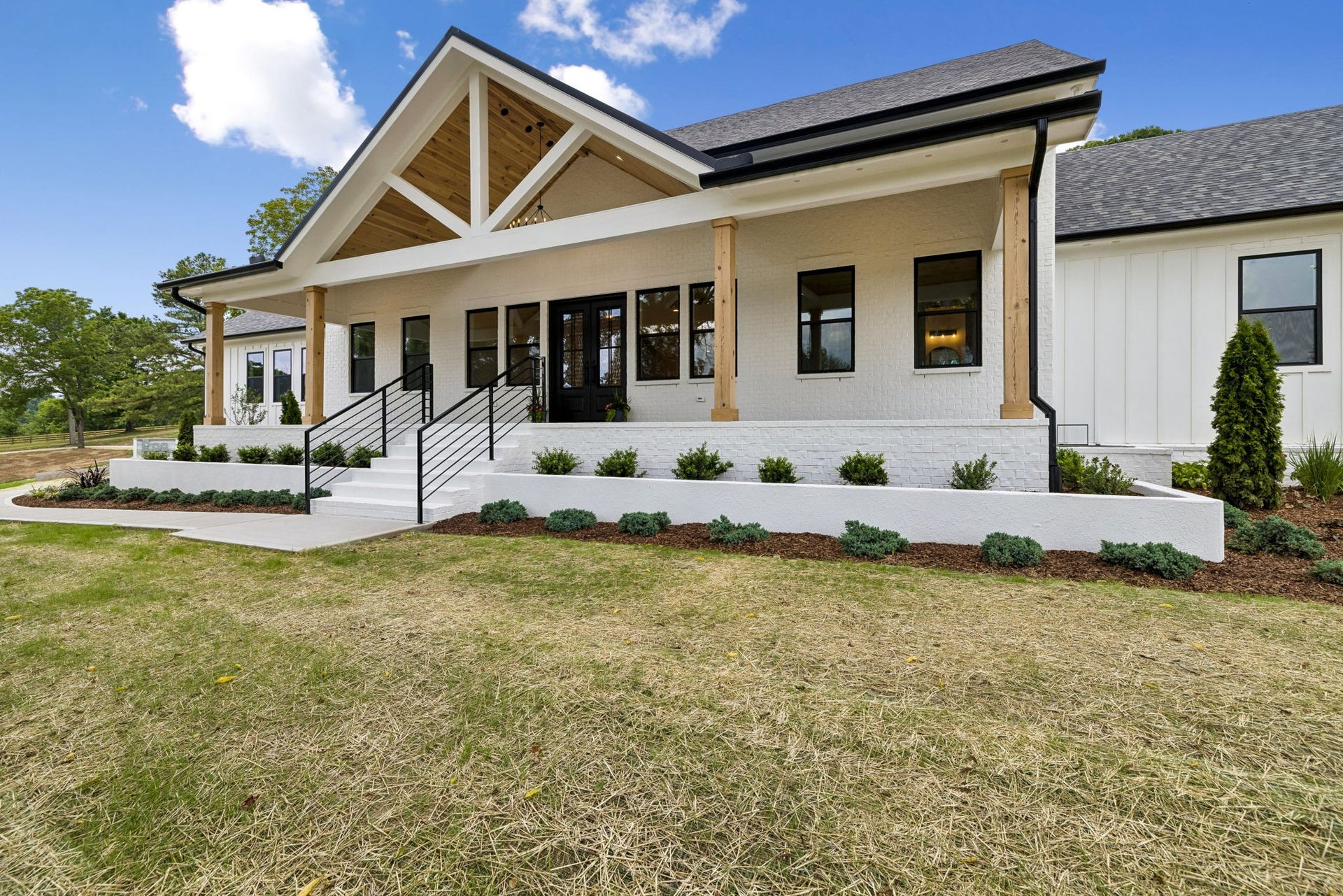 2472 Taylor Rd, Columbia, TN 38401 Incredible angle of the front porch with wooden posts and wooden ceiling
