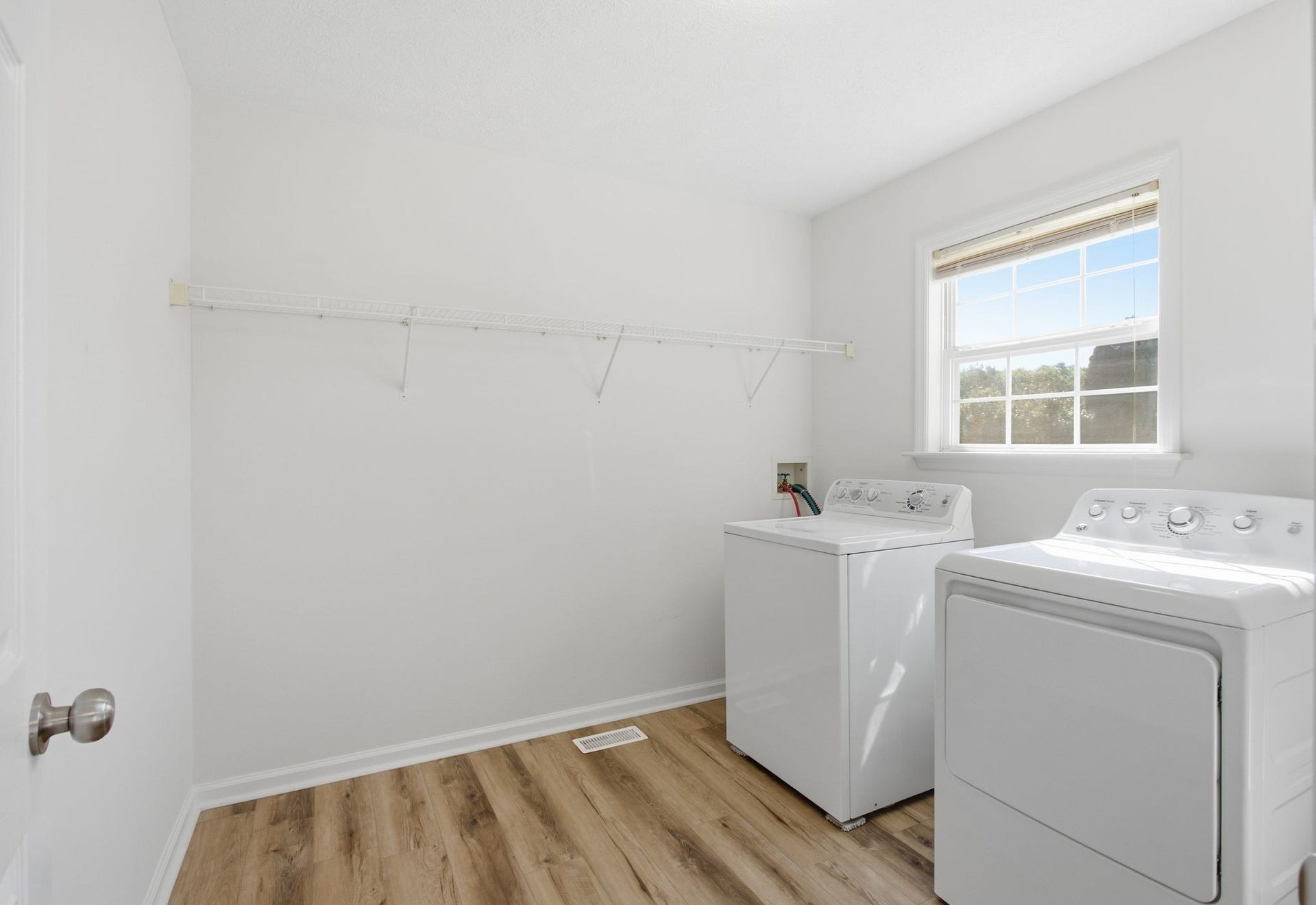 Laundry/Utility Room ~ located on the main floor.  Washer and Dryer to remain