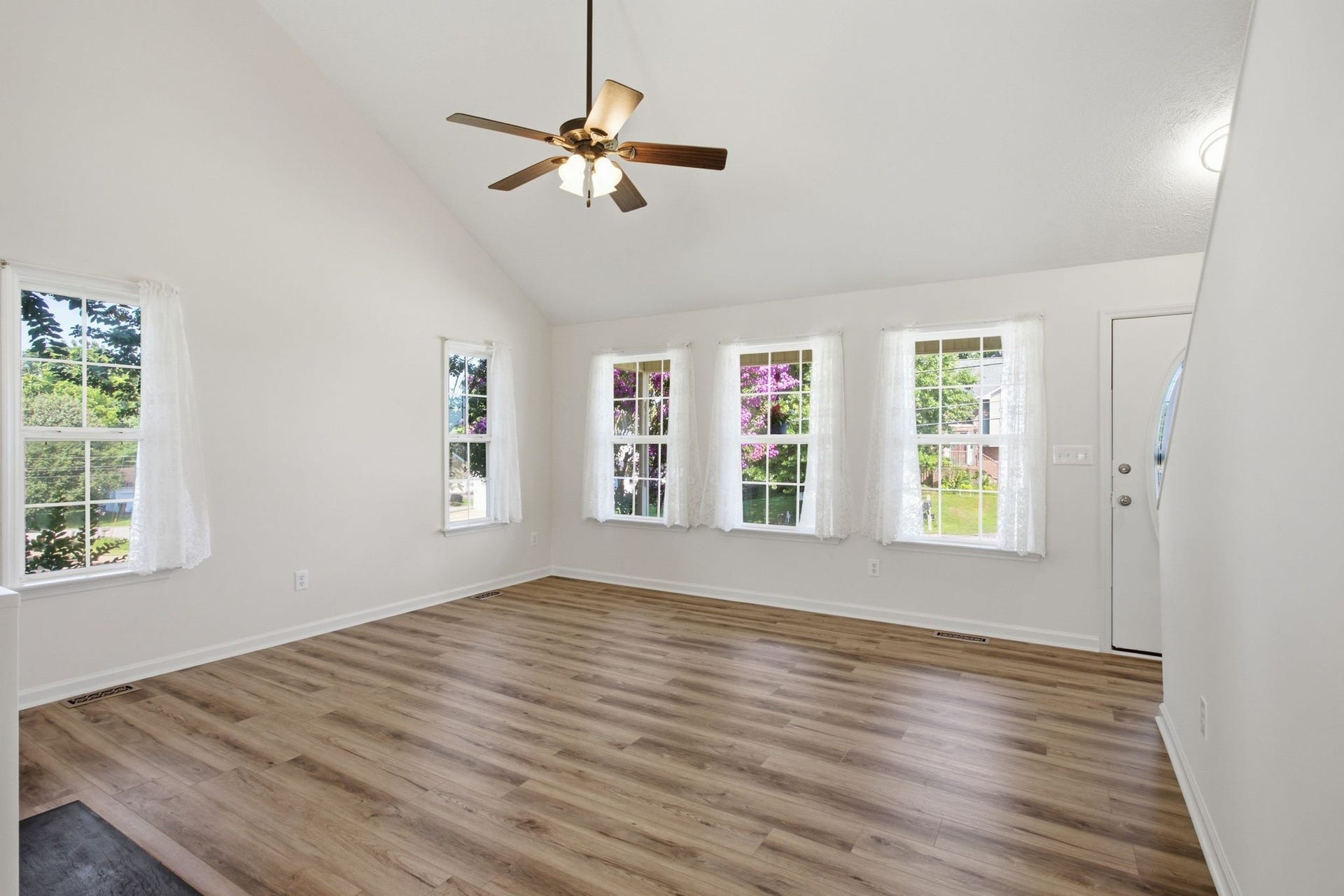 This room has a wonderful airy feeling with the vaulted ceilings