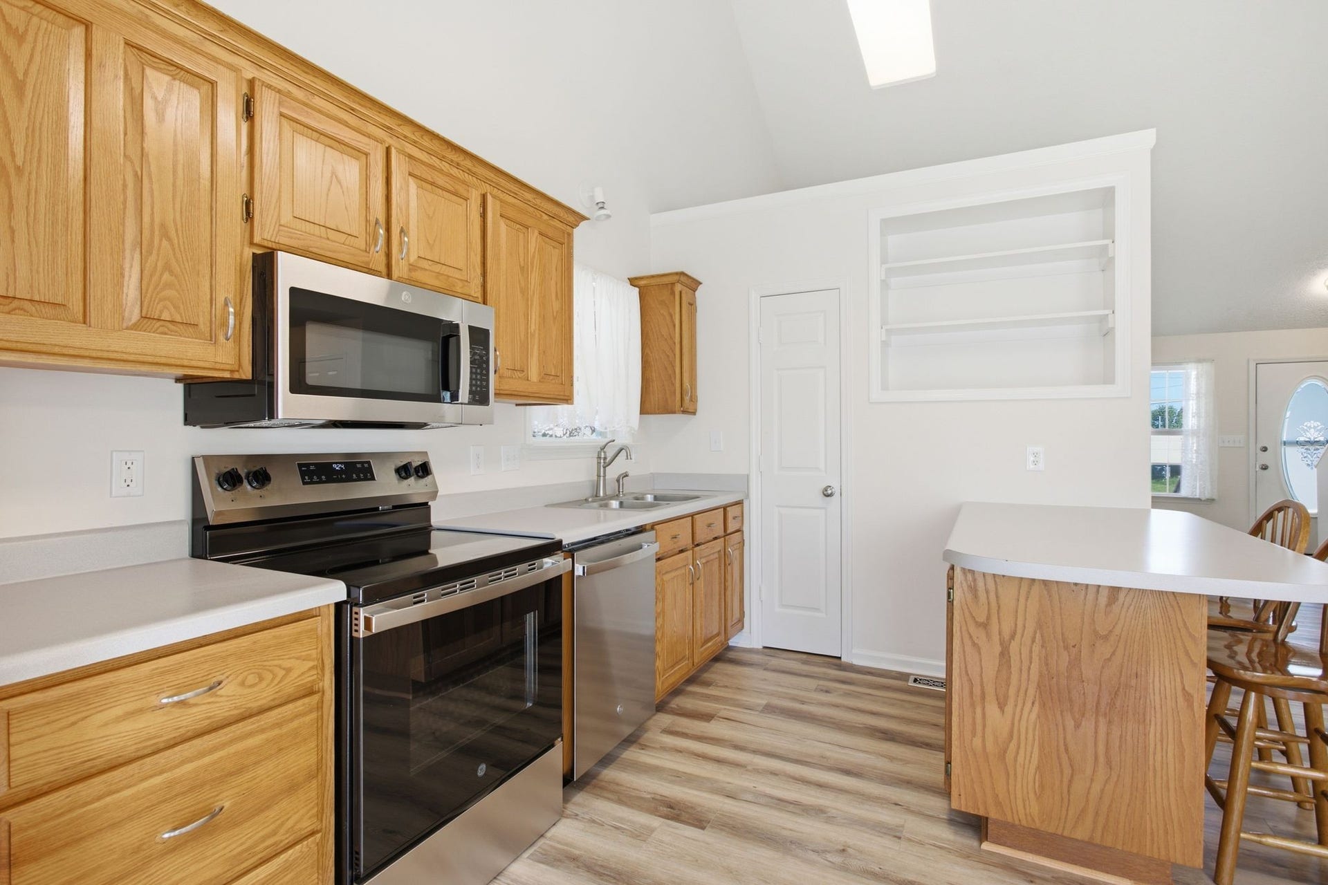 Breakfast bar, pantry and shelving!