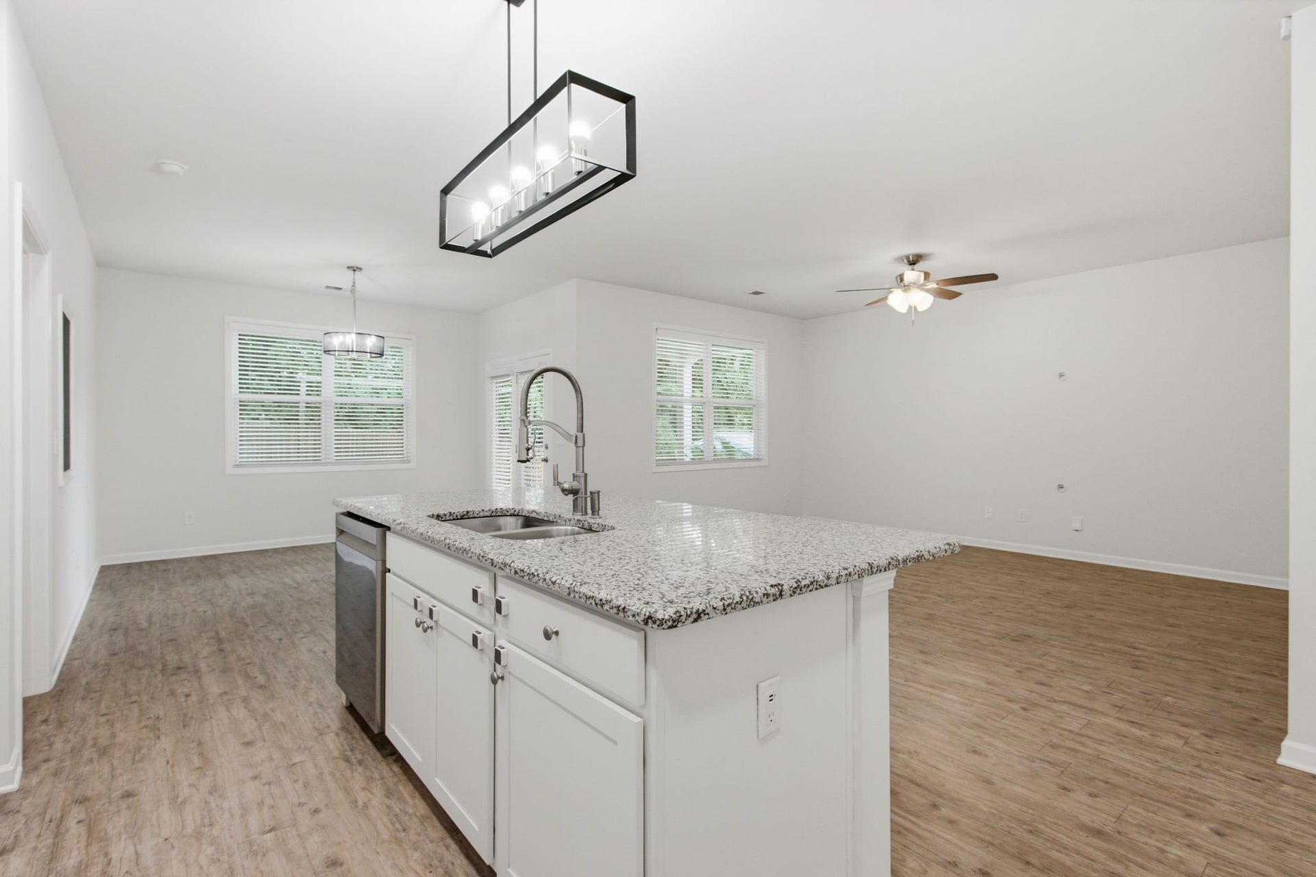 716 Prominence Rd, Columbia, TN 38401 The Island has a Double Stainless Steel Sink, Granite Counters and Cabinet Storage