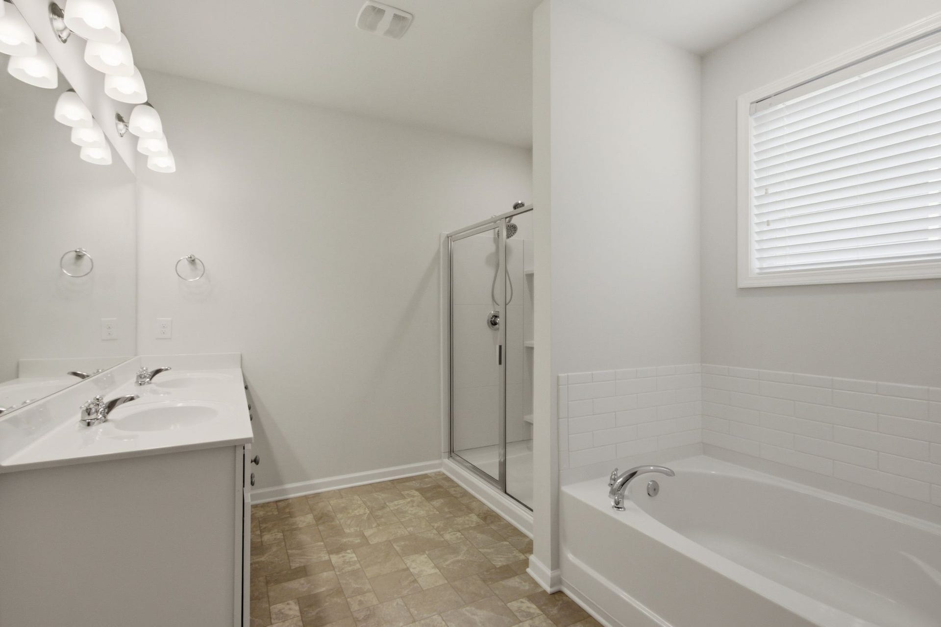 716 Prominence Rd, Columbia, TN 38401 The Primary Suite Bathroom has a Separate Tub and Shower