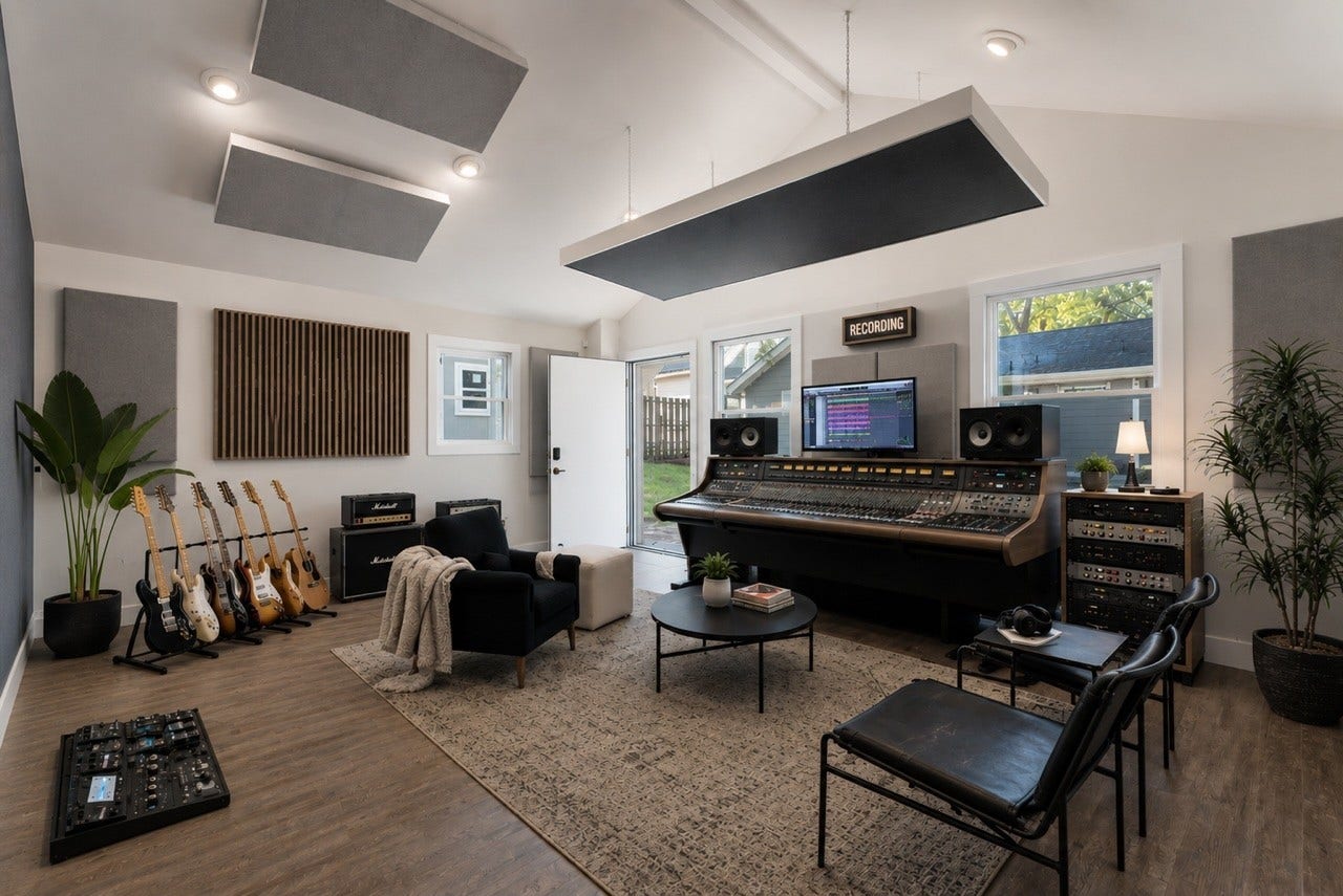 877 Carter St, Nashville, TN 37206 AI assisted staging to help illustrate the potential use and layout of the detached studio/ recording space.
