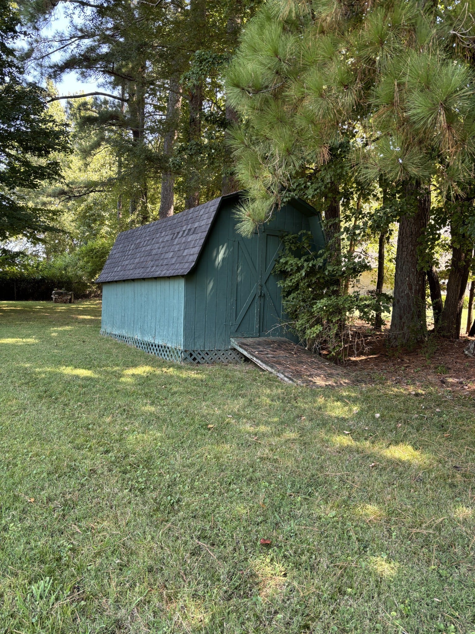 141 Doak Rd, Manchester, TN 37355 Storage building remains with property. 10x16. Each end has ramps & doors easy access for lawn equipment.