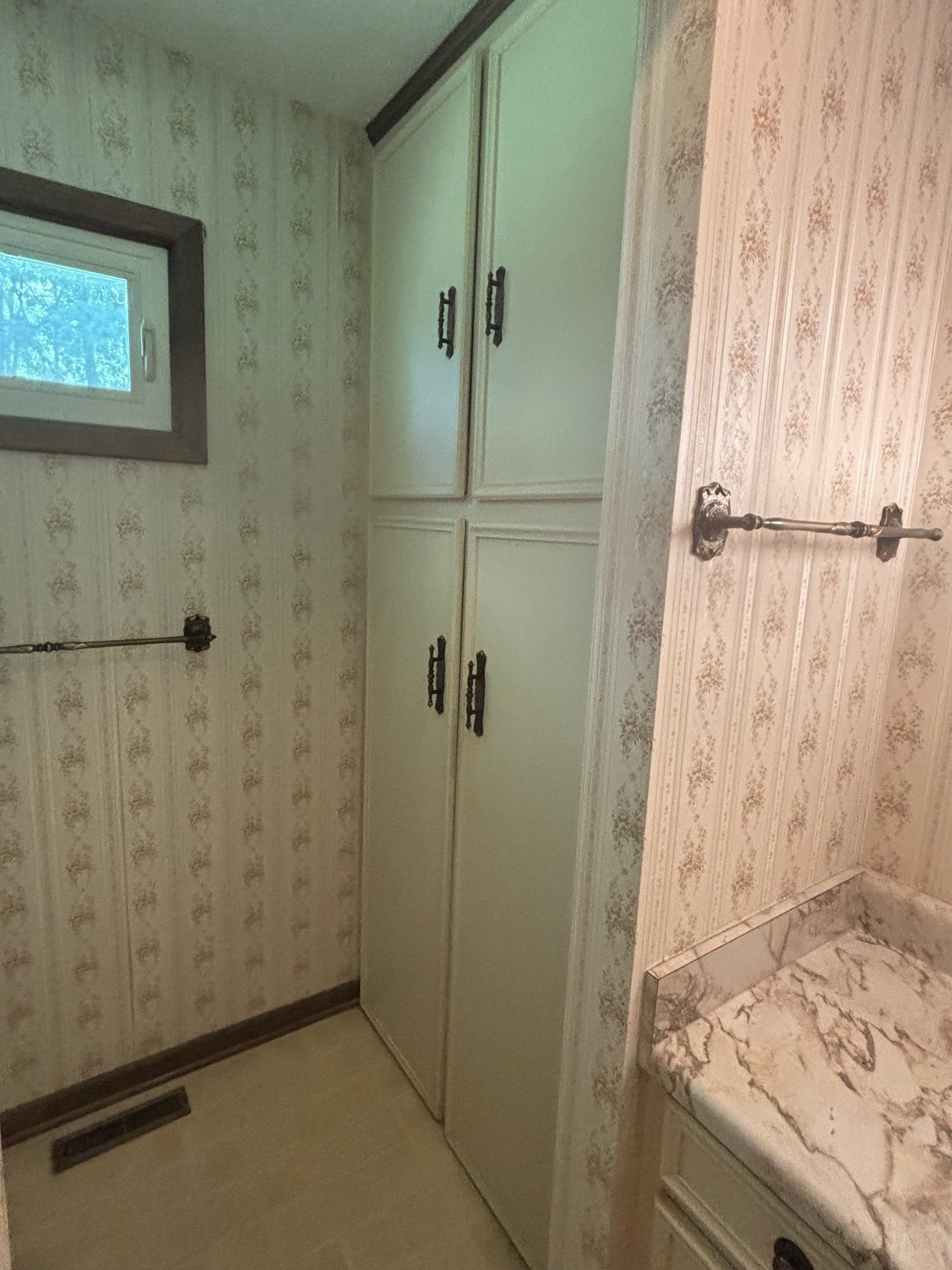 141 Doak Rd, Manchester, TN 37355 Cabinet style Linen Closet in Guest Bathroom.