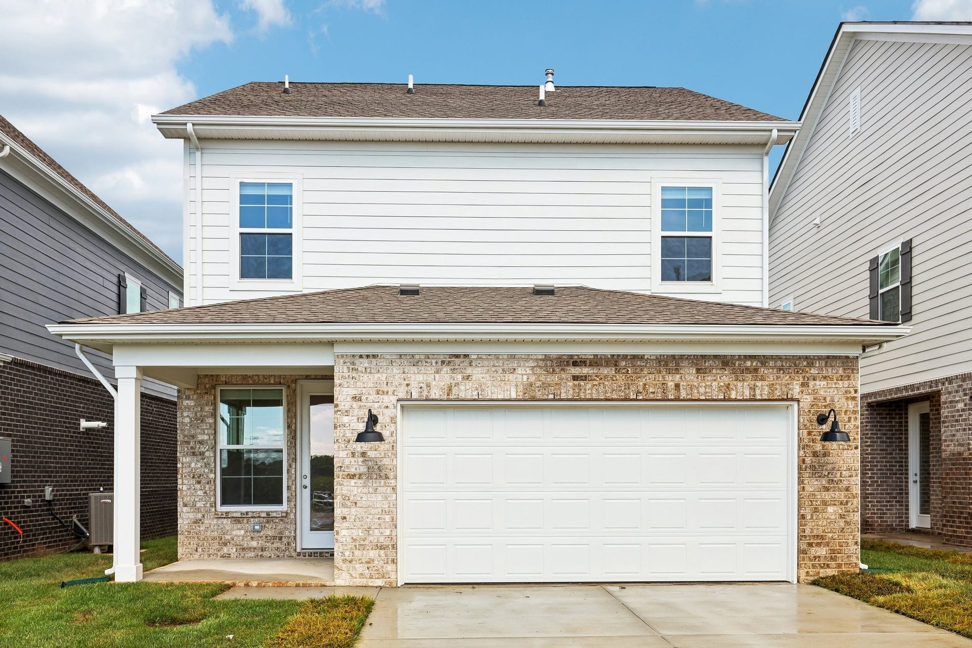 2705 Wilkinson Pike, #2, Murfreesboro, TN 37129 A covered patio, accessible directly from the sunroom, provides the perfect space for outdoor relaxation, entertaining or enjoying your morning coffee.