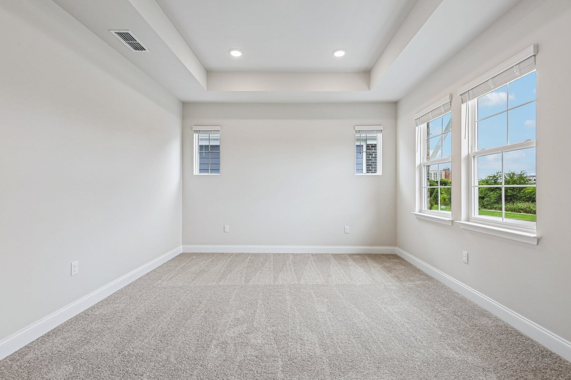 2705 Wilkinson Pike, #2, Murfreesboro, TN 37129 The primary bedroom, located on the second floor, features a trey ceiling that adds architectural interest and a sense of spaciousness.