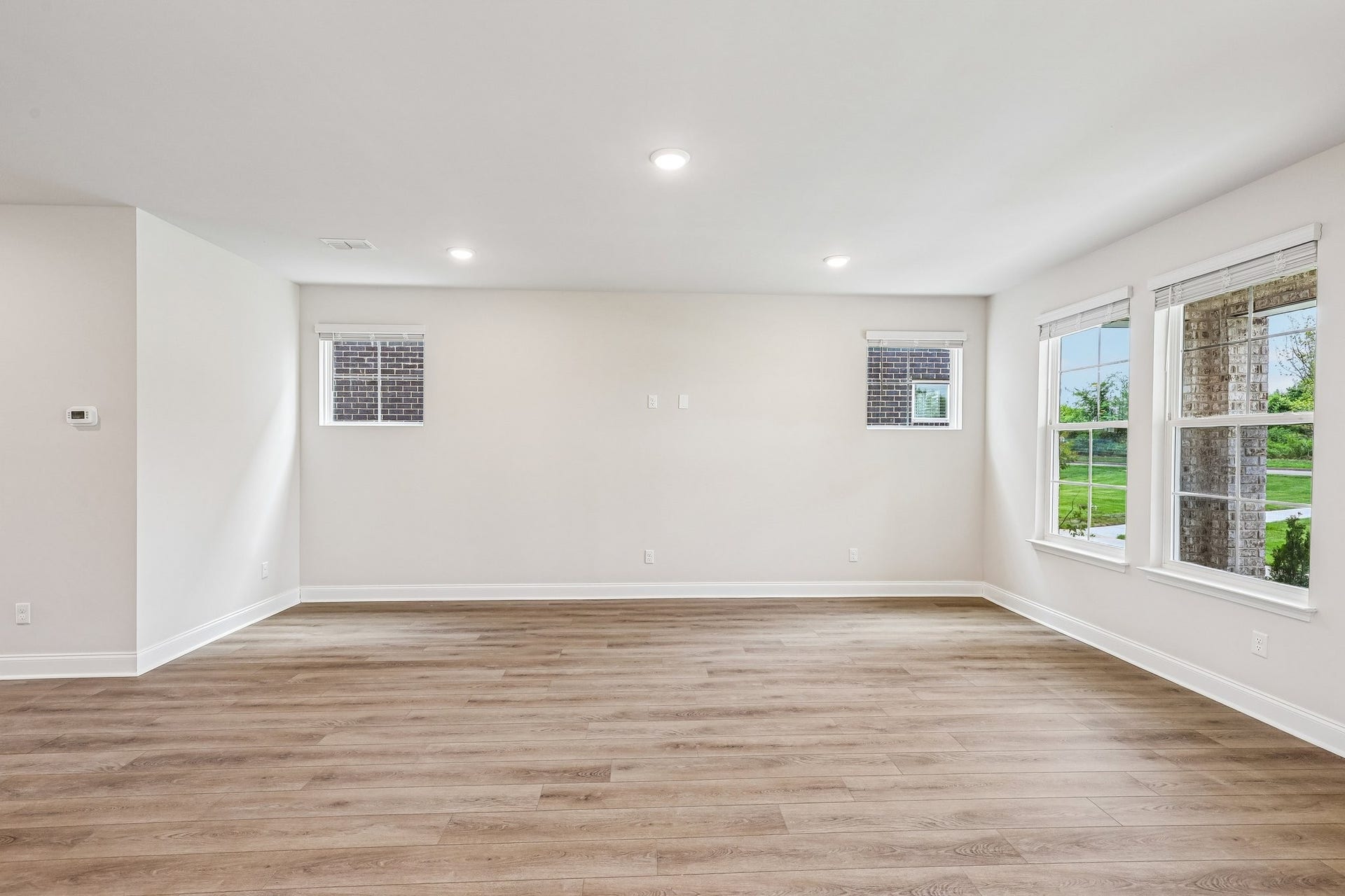 2705 Wilkinson Pike, #2, Murfreesboro, TN 37129 The spacious 20' x 17' great room offers ample flexibility for furniture arrangement, making it easy to create both comfortable living and entertaining areas.