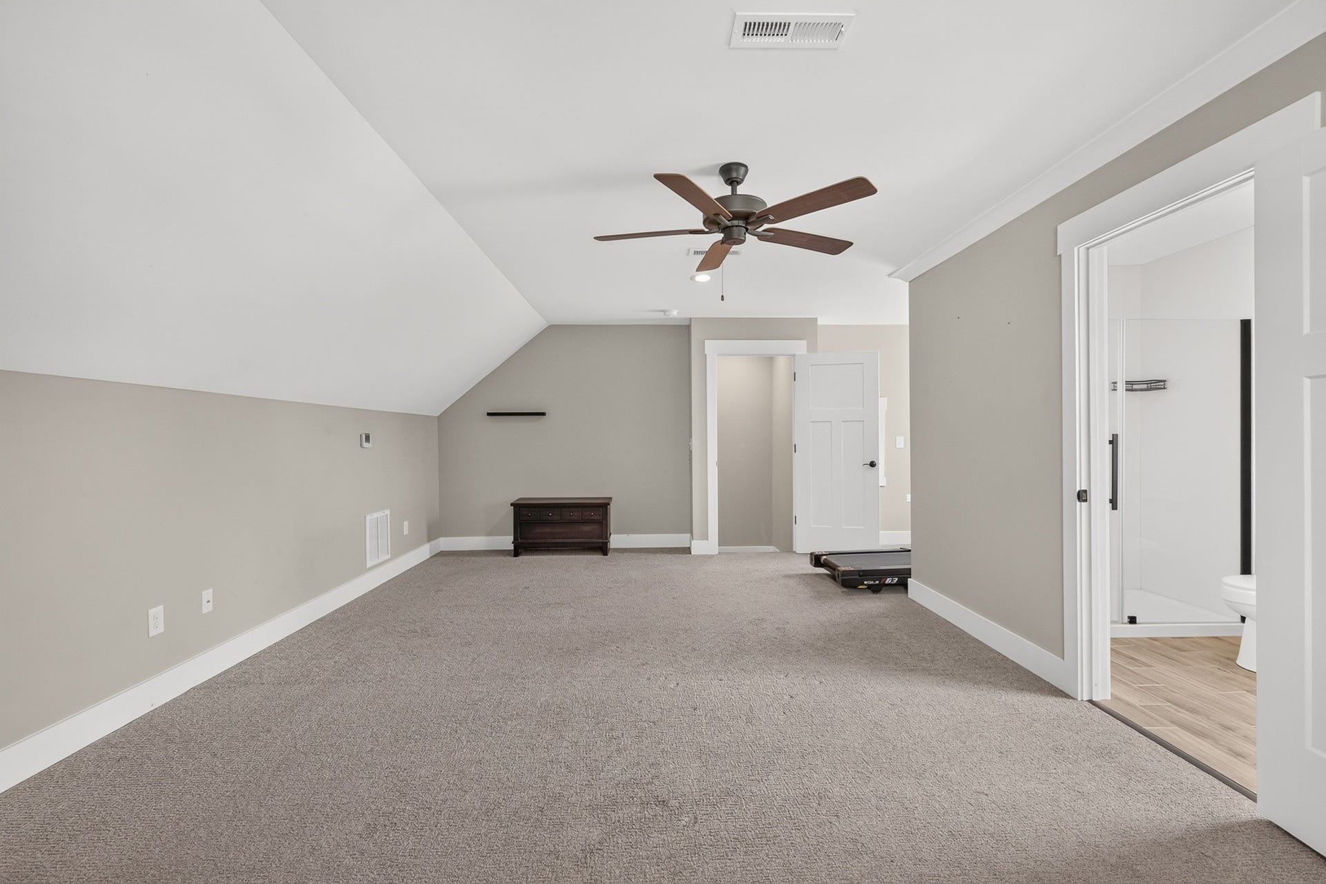 197 Bluegrass Rd, Manchester, TN 37355 View of the bonus room located upstairs. It has a full bath and closet