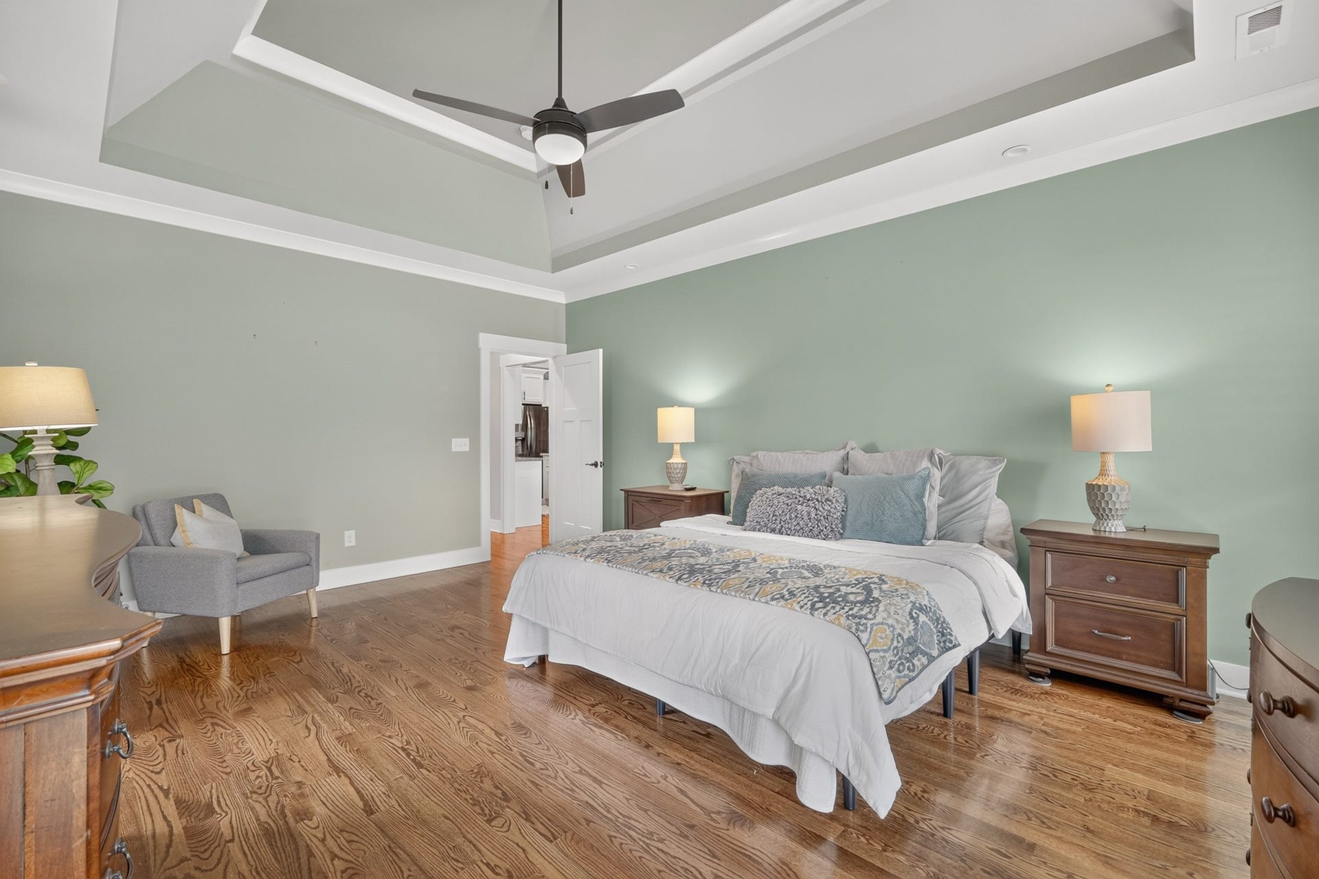 197 Bluegrass Rd, Manchester, TN 37355 Primary bedroom is large with double tray ceiling and hardwood floors
