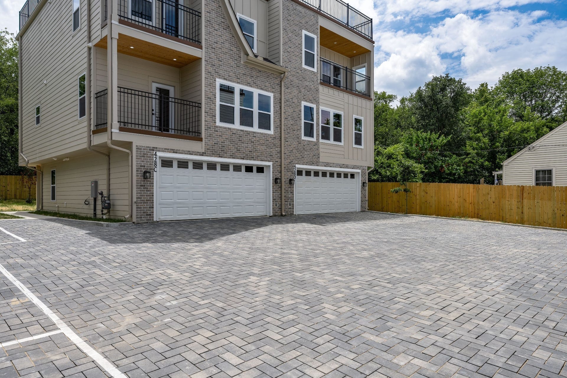 428 E Trinity Ln, #B, Nashville, TN 37207 Rear Units C and D Garages with beautifully paved courtyard drives.
