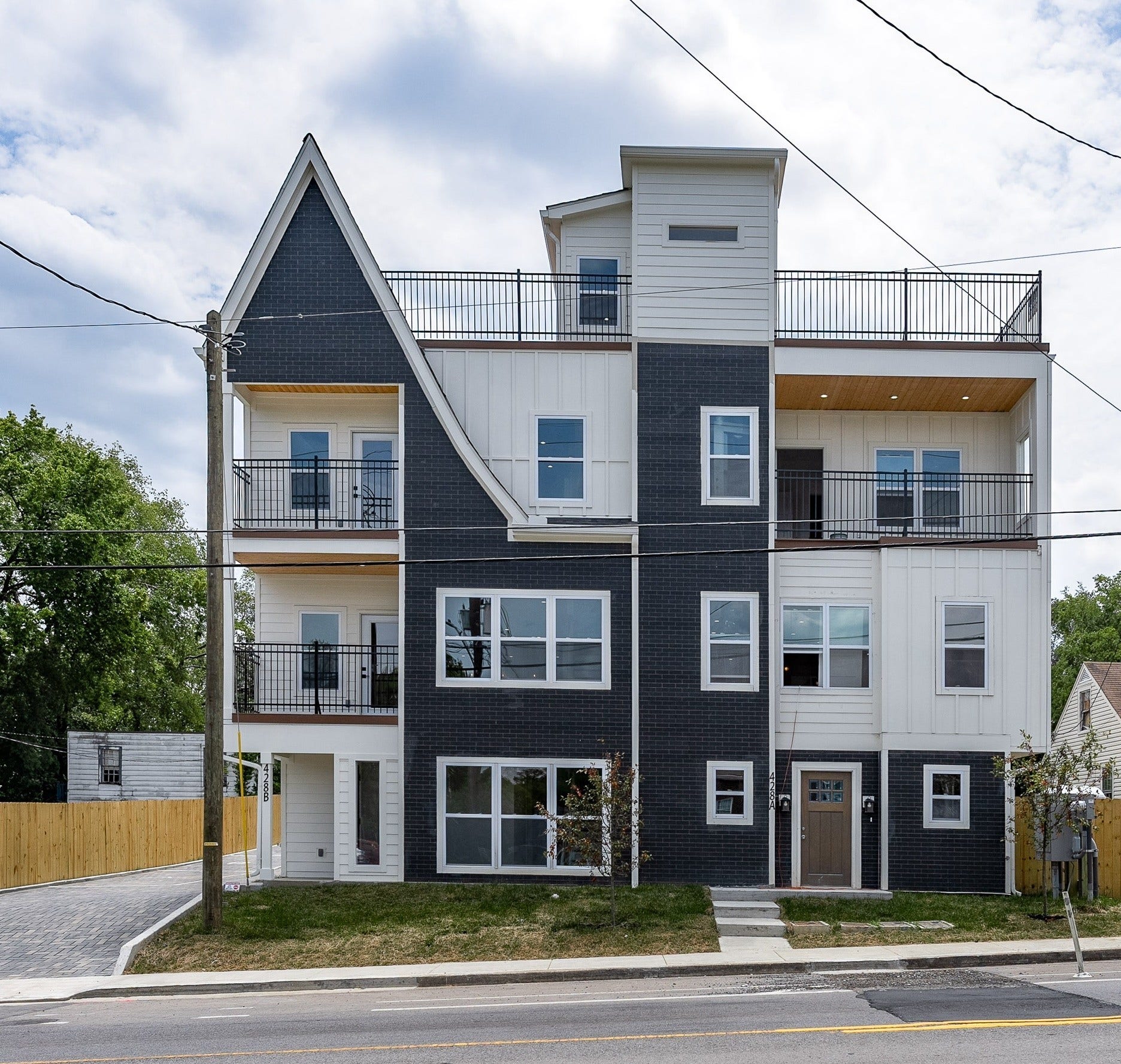 428 E Trinity Ln, #B, Nashville, TN 37207 428 East Trinity Lane, Unit B. Boasts 2,325sf. 3 Bed/3.5 Bath. 832sf. Rooftop Deck with partial views of Downtown Nashville! 2 Car Garage with Courtyard and shared Backyard common area completely fenced in on 3 sides for privacy.