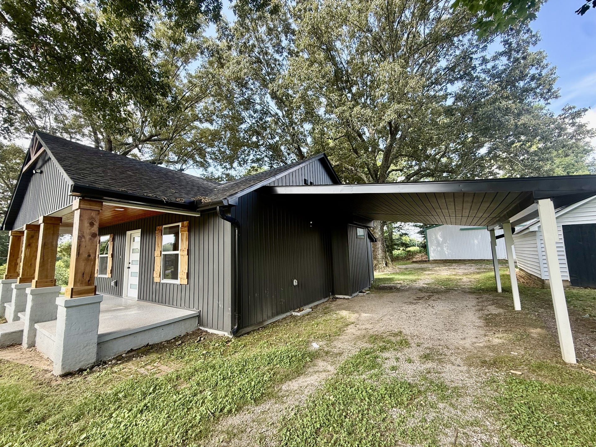 1541 Summitville Rd, Manchester, TN 37355 Large carport on the right of the home
NEW ROOF, WINDOWS, DOORS, GUTTERS, AND HVAC, TO NAME A FEW