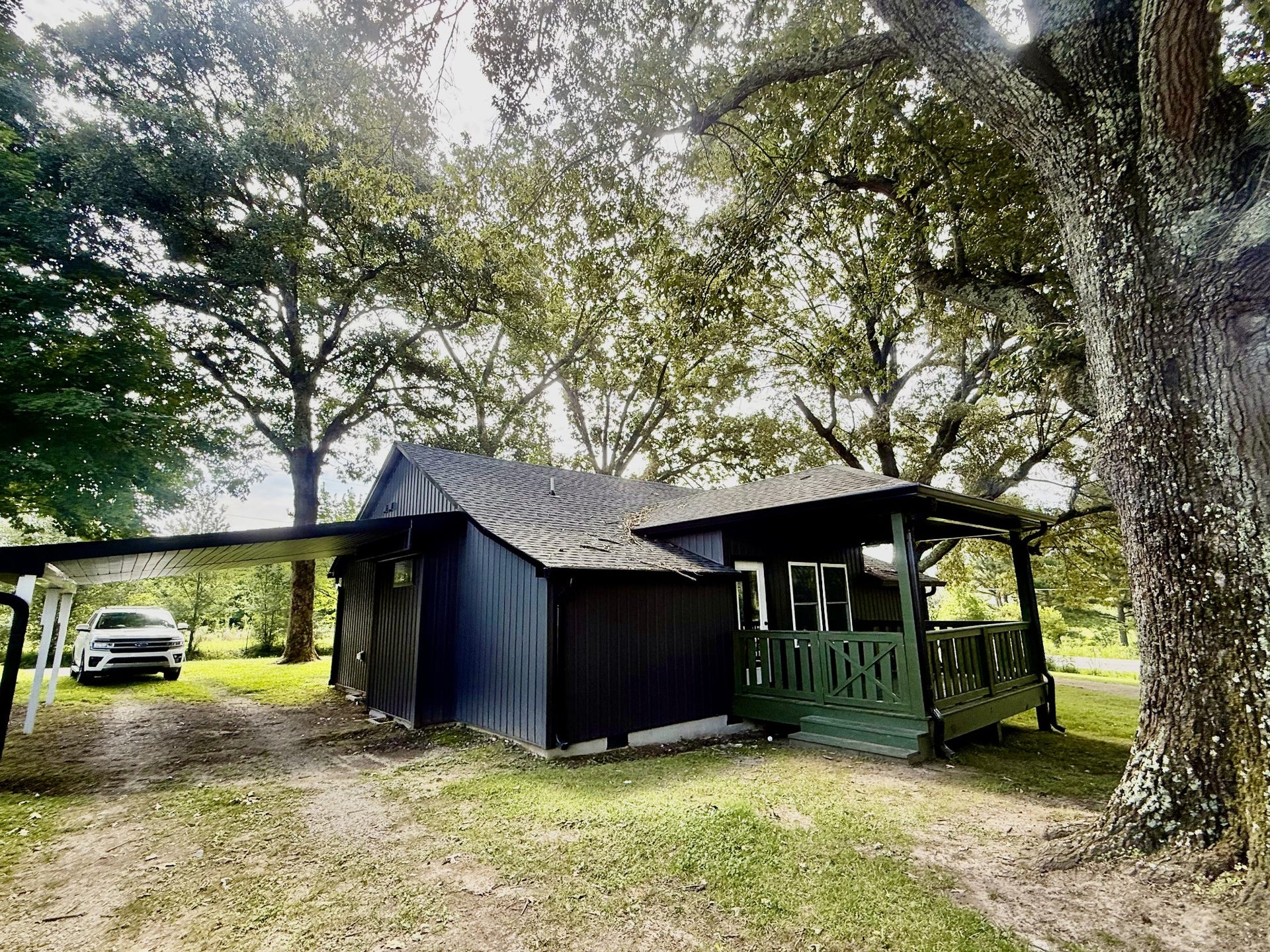 1541 Summitville Rd, Manchester, TN 37355 Back side of home and carport and the large covered porch