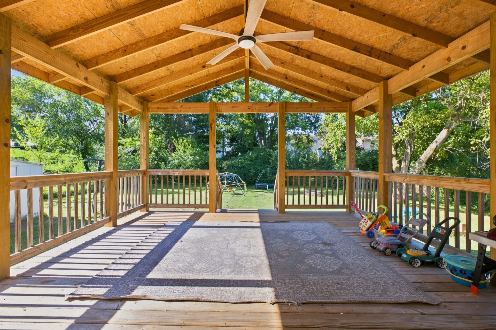 3312 Masonwood Dr, Nashville, TN 37207 The covered pavilion is the heart of the backyard, featuring soaring vaulted ceilings, an oversized ceiling fan, and exceptional space for year-round entertaining, outdoor dining, and relaxing.