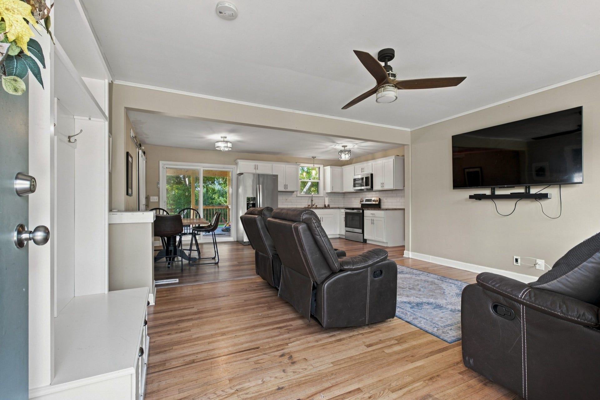 3312 Masonwood Dr, Nashville, TN 37207 Spacious open concept living room seamlessly flows into the kitchen and dining area, featuring hardwood floors, abundant natural light, and an ideal layout for everyday living and entertaining.