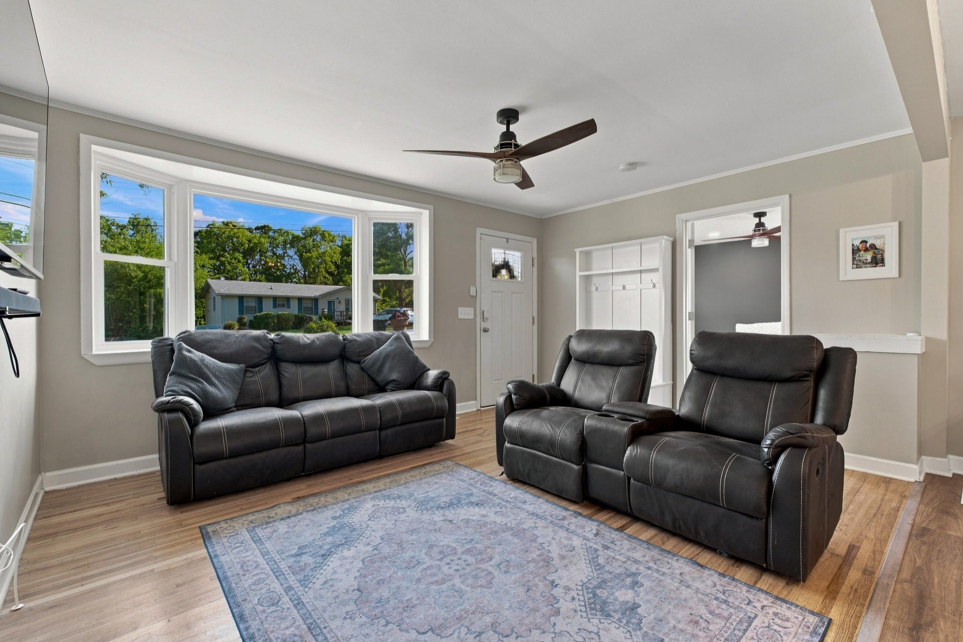 3312 Masonwood Dr, Nashville, TN 37207 The oversized bay window fills the living room with abundant natural light, creating a bright and inviting space to relax or entertain.
