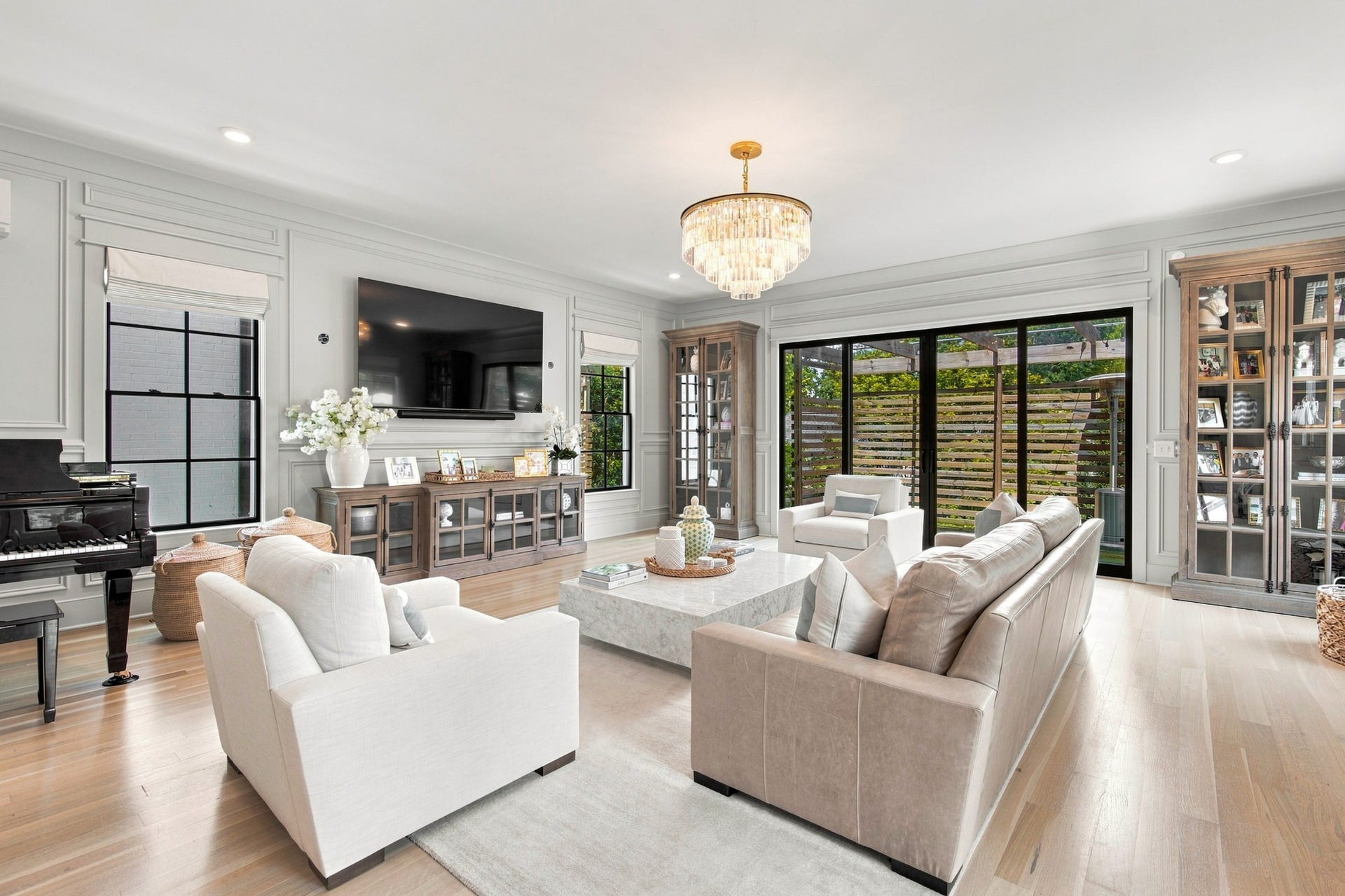 3914 Abbott Martin Rd, Nashville, TN 37215 Visual Comfort Sconces will be hung on the tv wall .