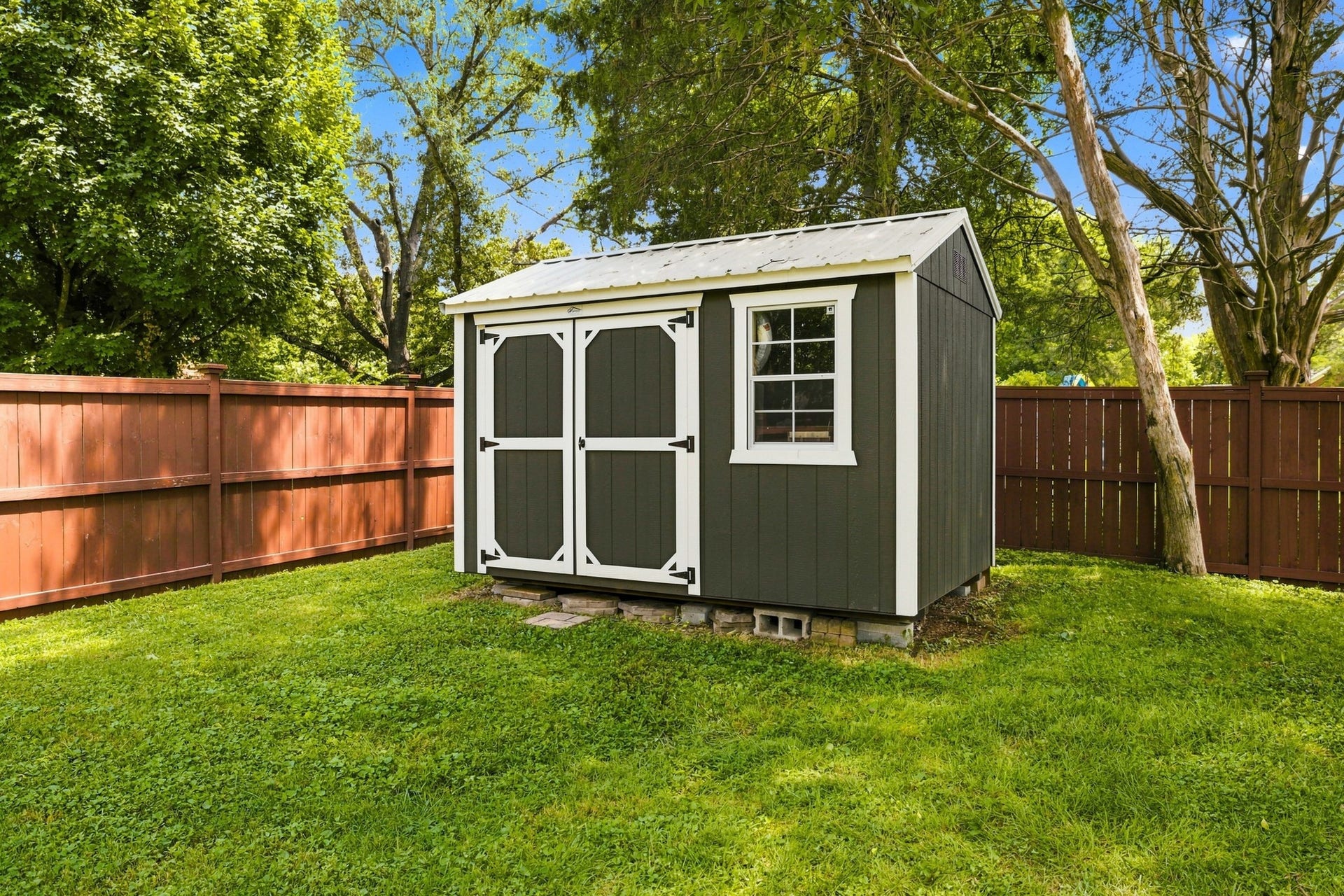 830 Banner Dr, Murfreesboro, TN 37129 A new 10x12 shed stays behind for keeping your lawn care tools.