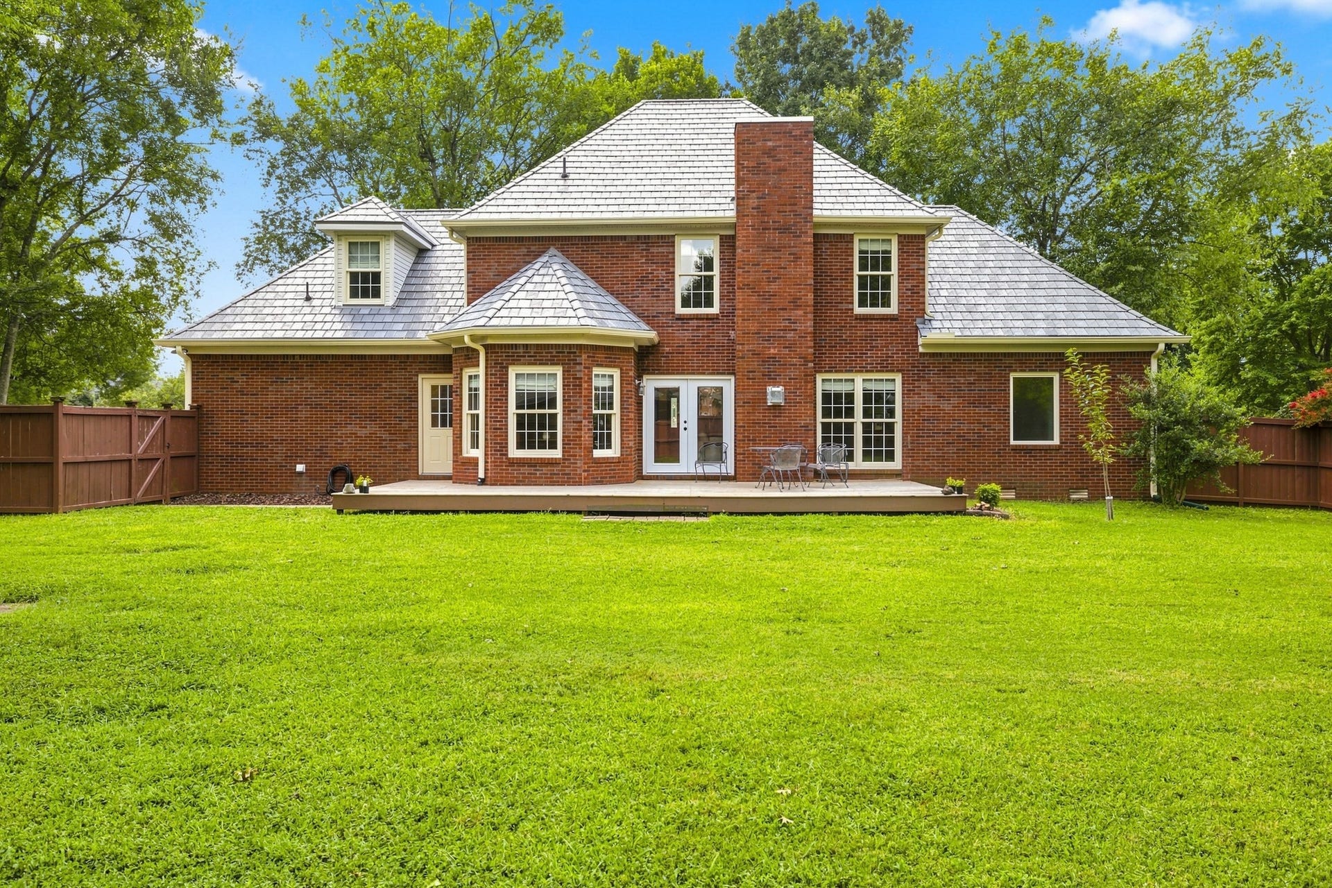 830 Banner Dr, Murfreesboro, TN 37129 The large, level backyard if fully fenced and a new deck makes entertaining or enjoying nature easy.