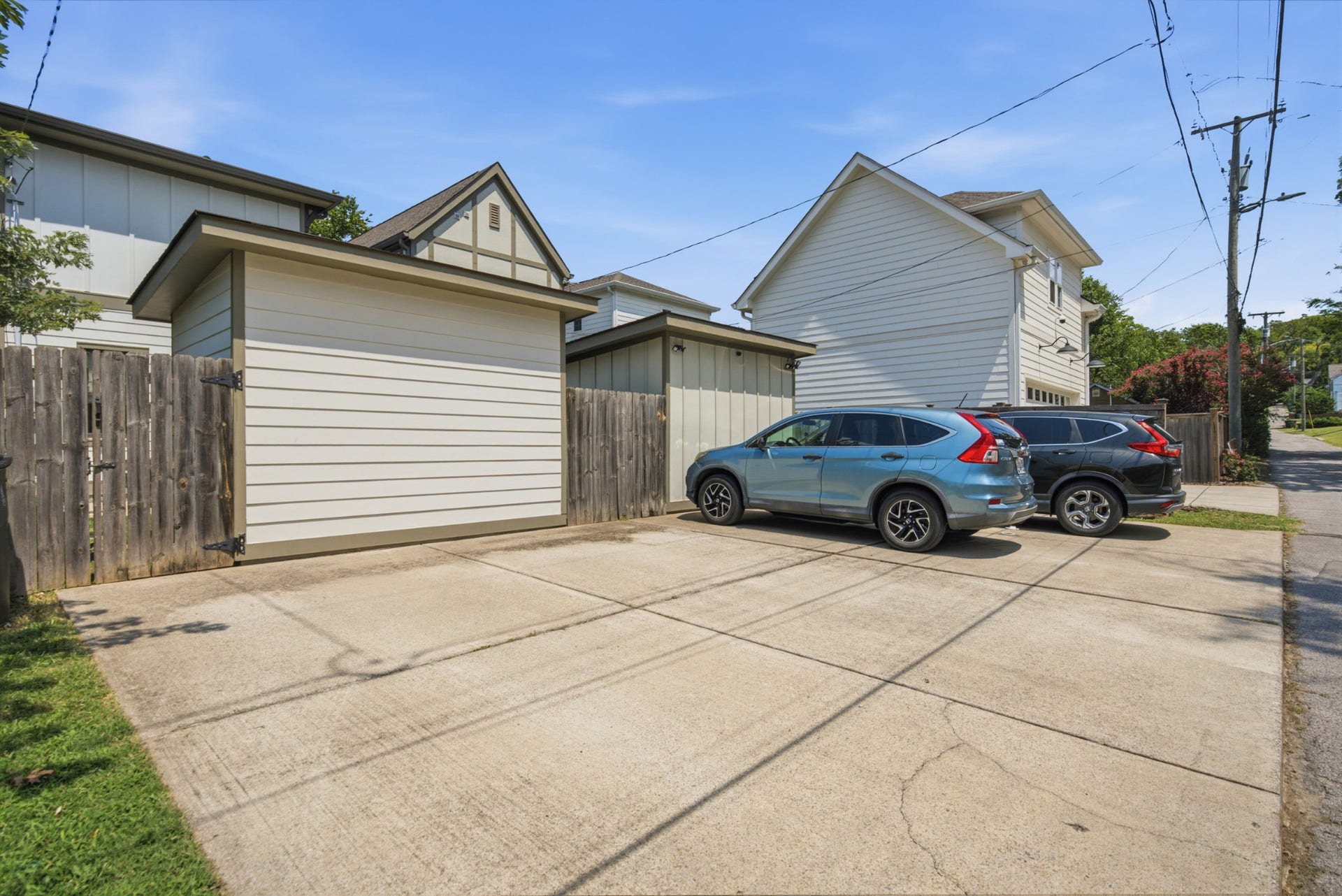 Parking pad in alley with room for 2 cars
