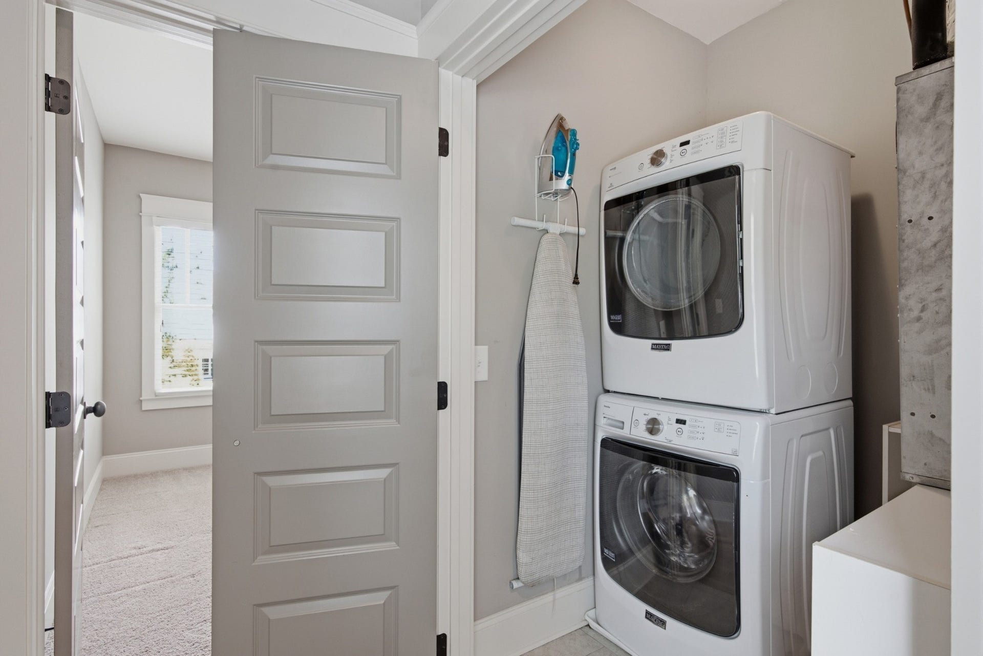 Laundry room on second floor.  Washer and dryer convey with sale!